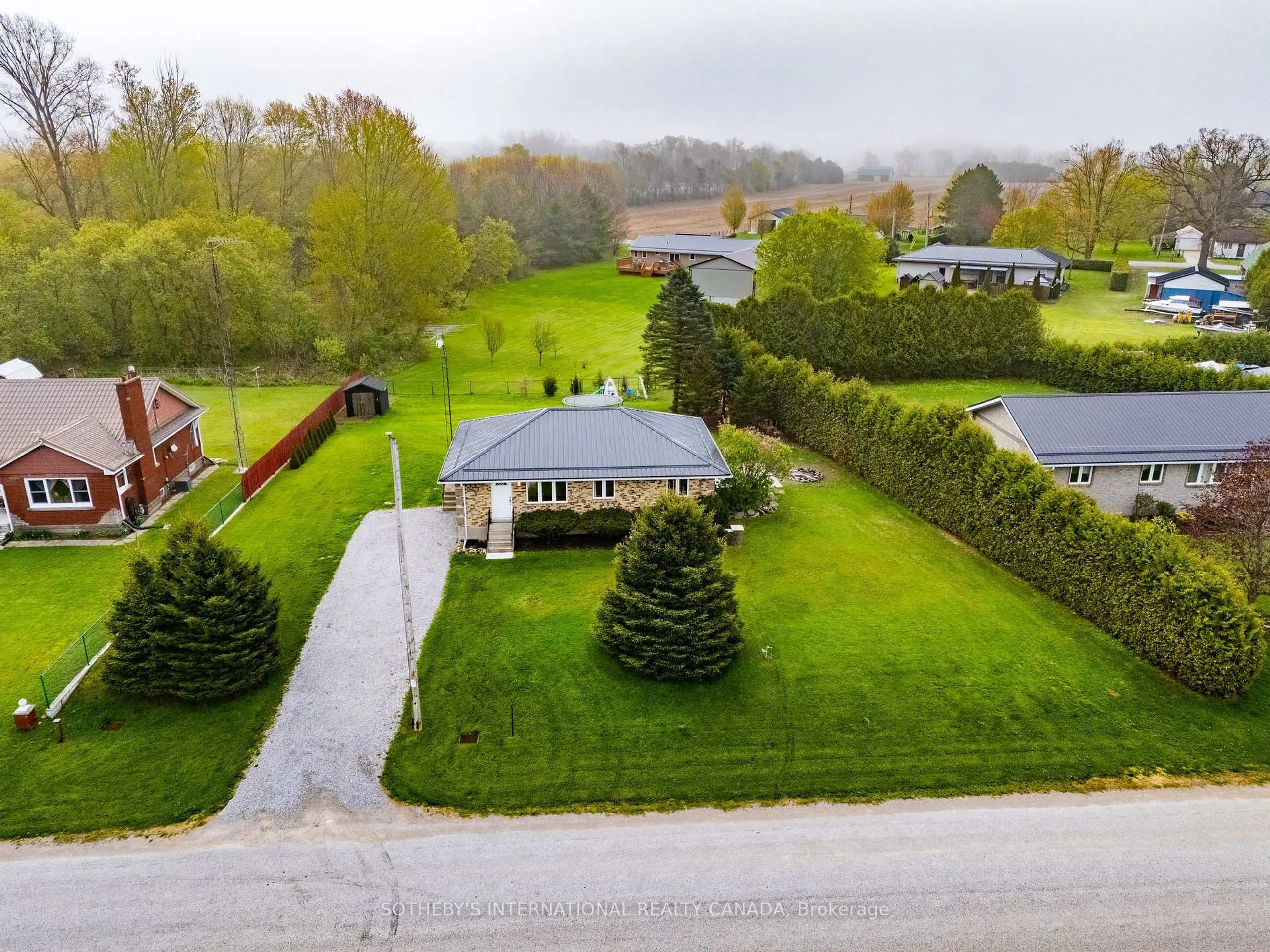 A pic from outside/outdoor area/front of a property/back of a property/a pic from drone, unknown for 12 3rd Concession Rd, Norfolk Ontario N0J 1E0