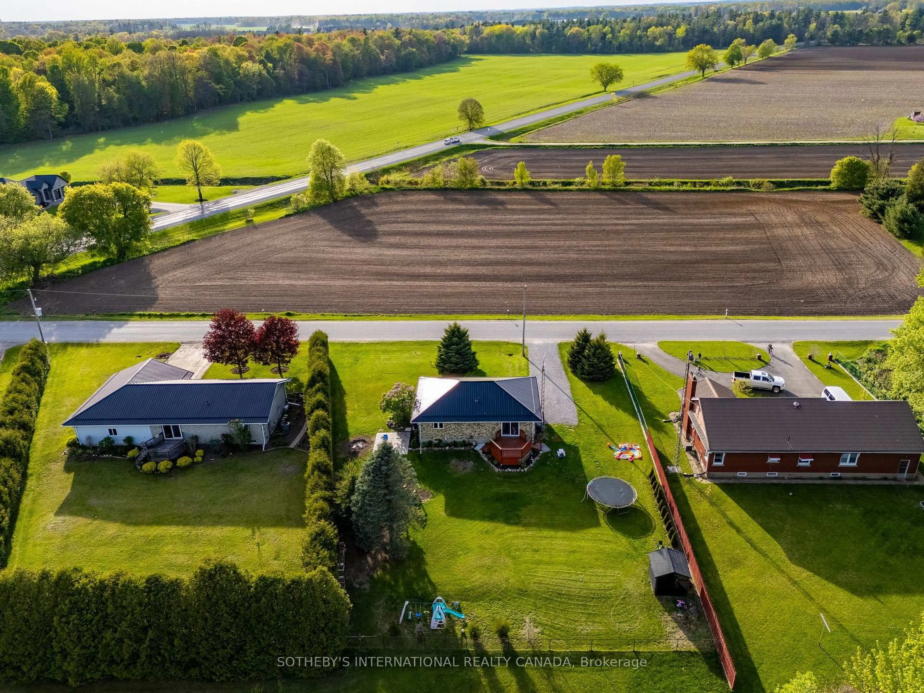 A pic from outside/outdoor area/front of a property/back of a property/a pic from drone, unknown for 12 3rd Concession Rd, Norfolk Ontario N0J 1E0