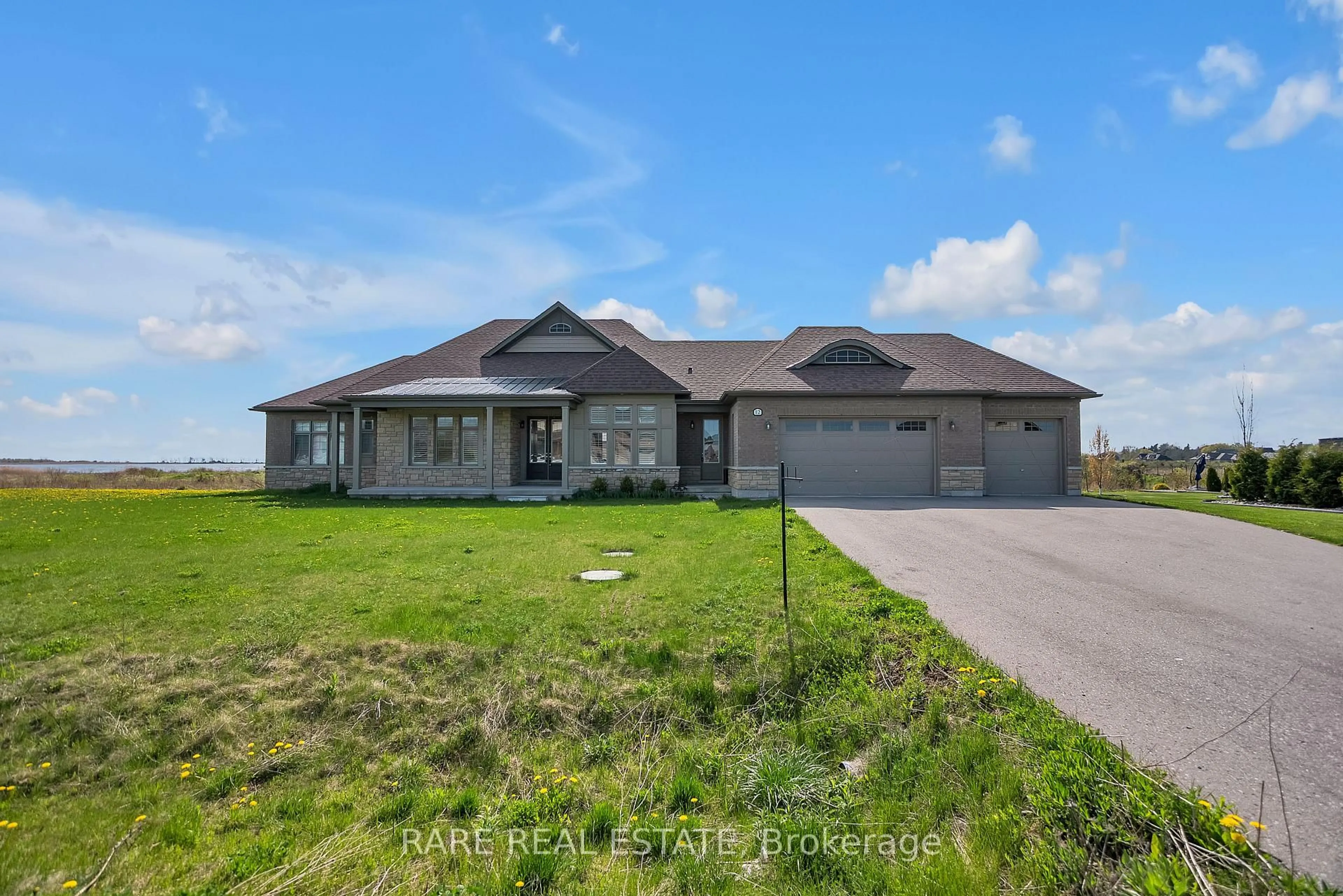 A pic from outside/outdoor area/front of a property/back of a property/a pic from drone, unknown for 12 Wellers Way, Quinte West Ontario K0K 1L0