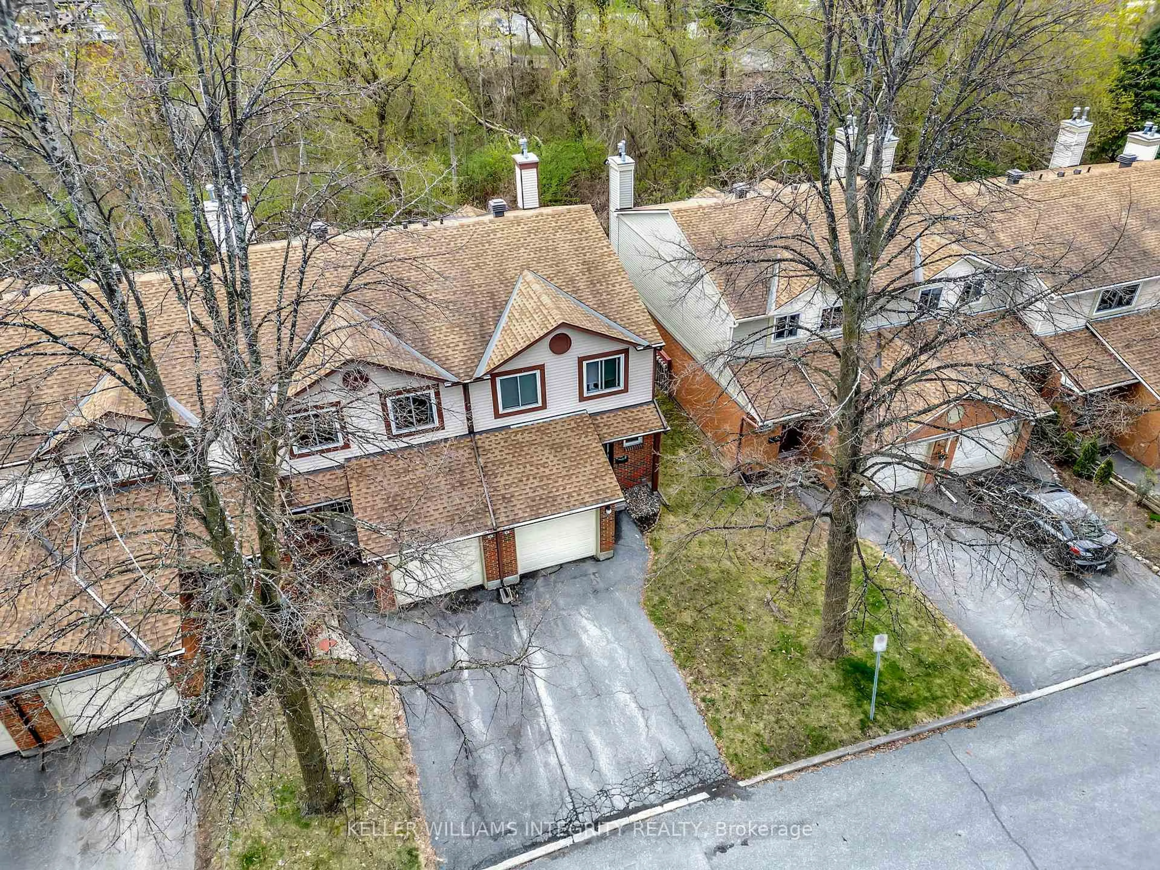 A pic from outside/outdoor area/front of a property/back of a property/a pic from drone, street for 6 Offenbach Lane #C, Ottawa Ontario K2G 4Z5