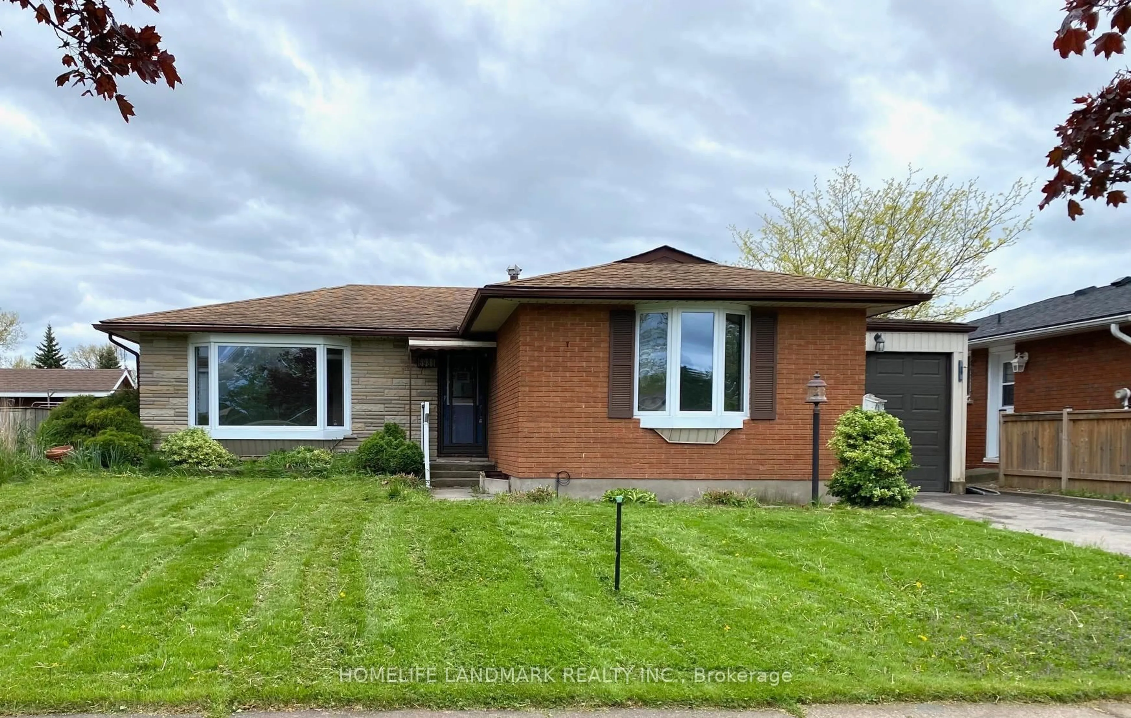 Home with brick exterior material, street for 6986 CENTENNIAL St, Niagara Falls Ontario L2G 2Z1