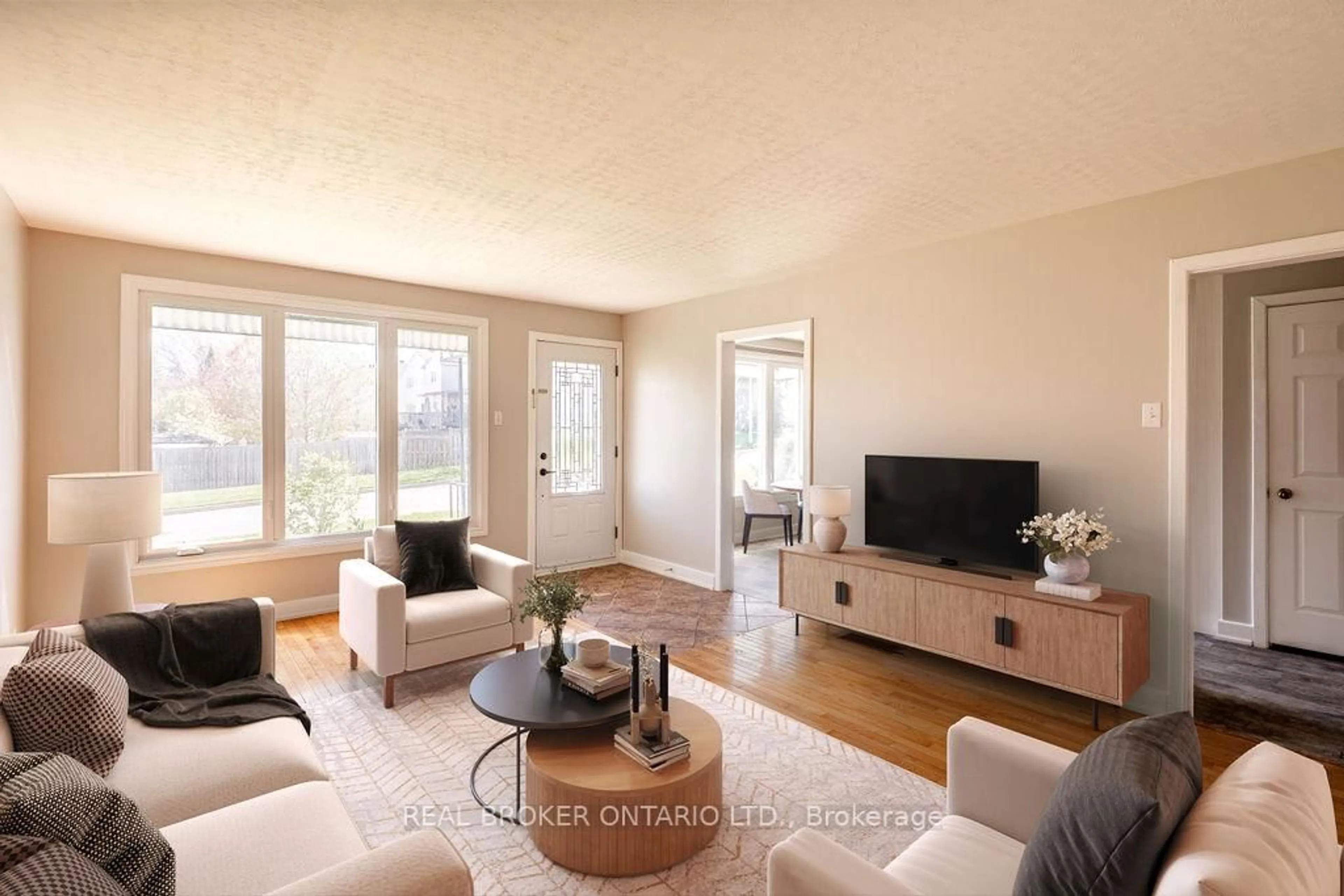 Living room with furniture, wood/laminate floor for 1278 St Jean St, Orleans Ontario K1C 1N6
