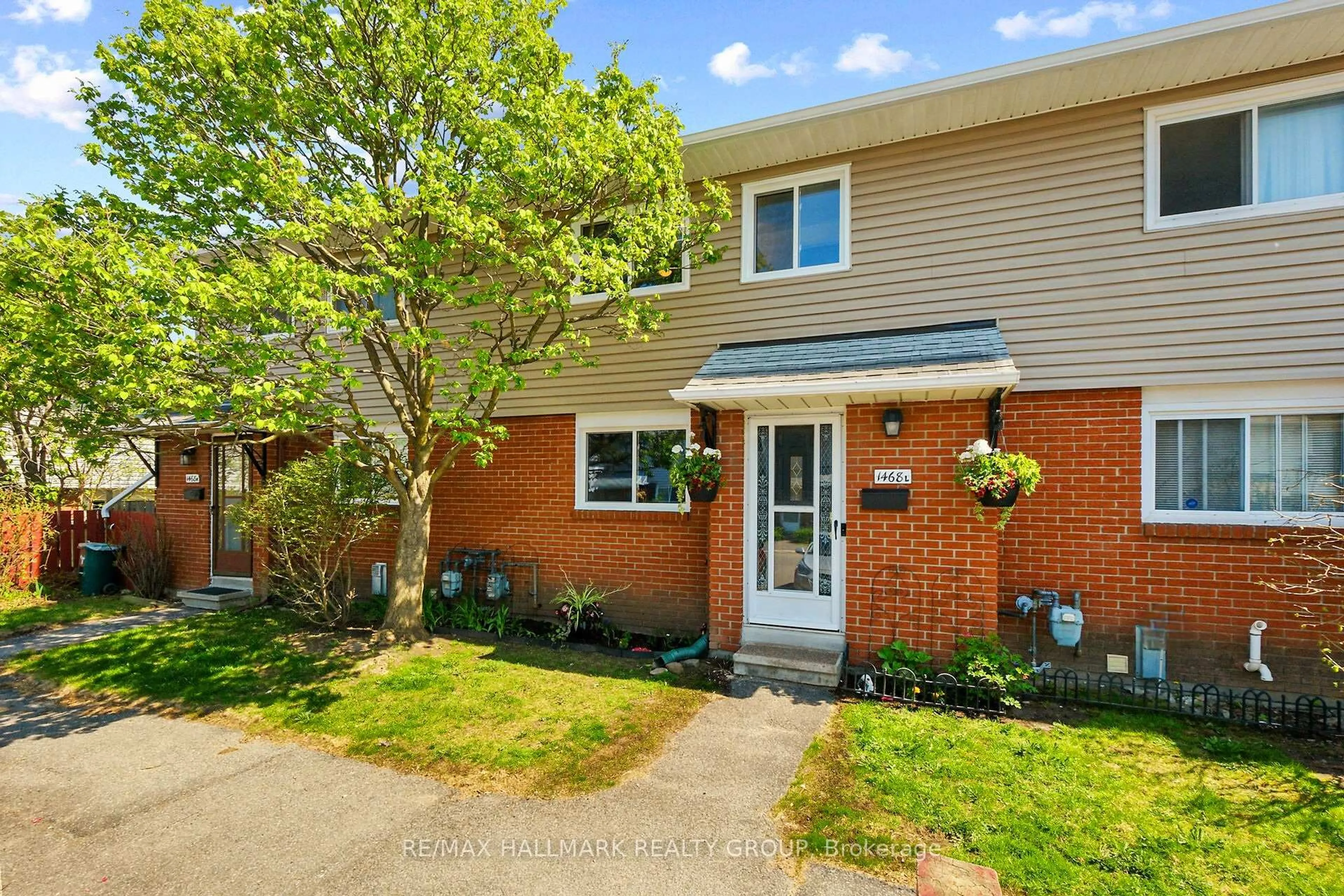Home with brick exterior material, street for 1468L Heatherington Rd #72, Ottawa Ontario K1V 6S1