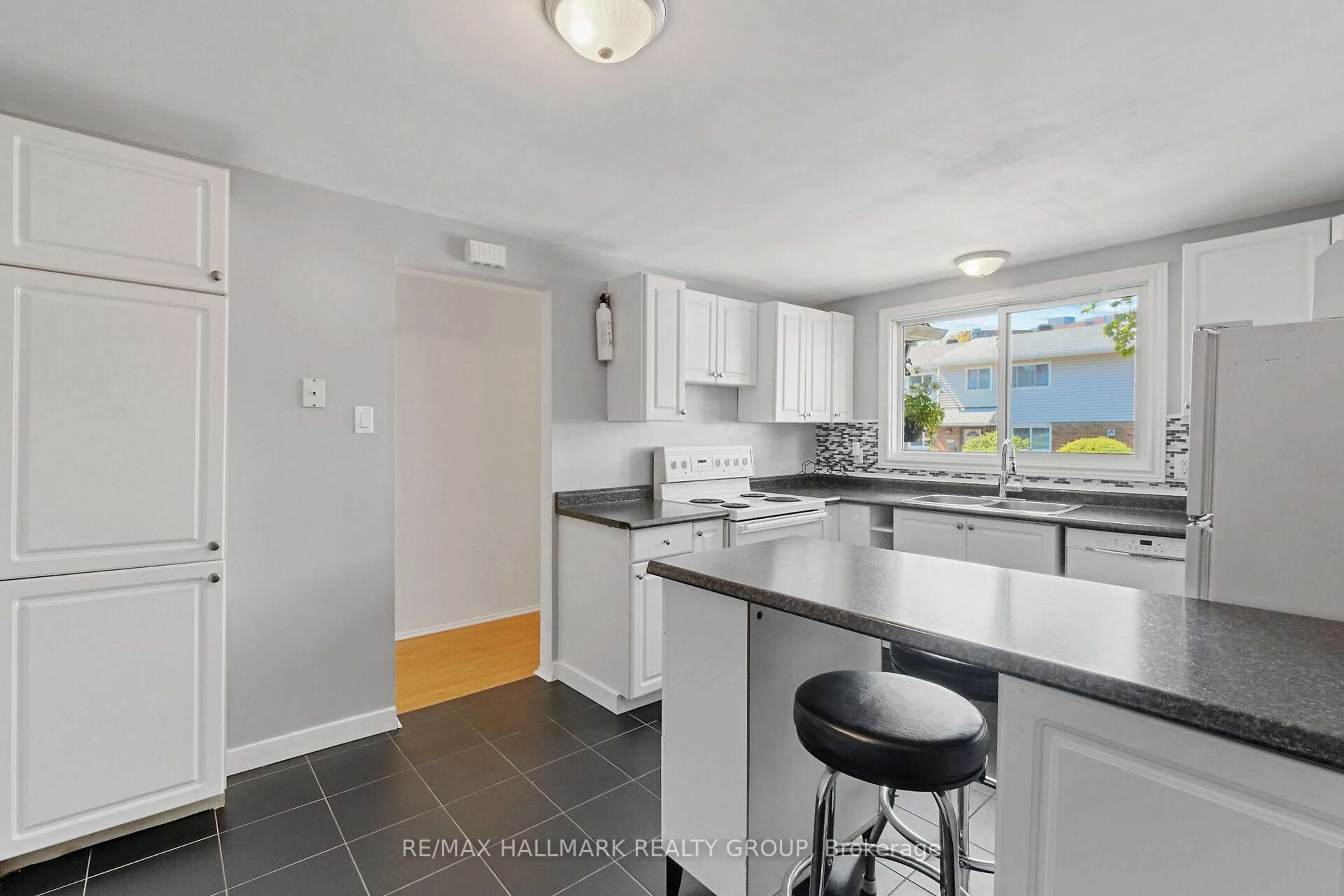 Open concept kitchen, ceramic/tile floor for 1468L Heatherington Rd #72, Ottawa Ontario K1V 6S1