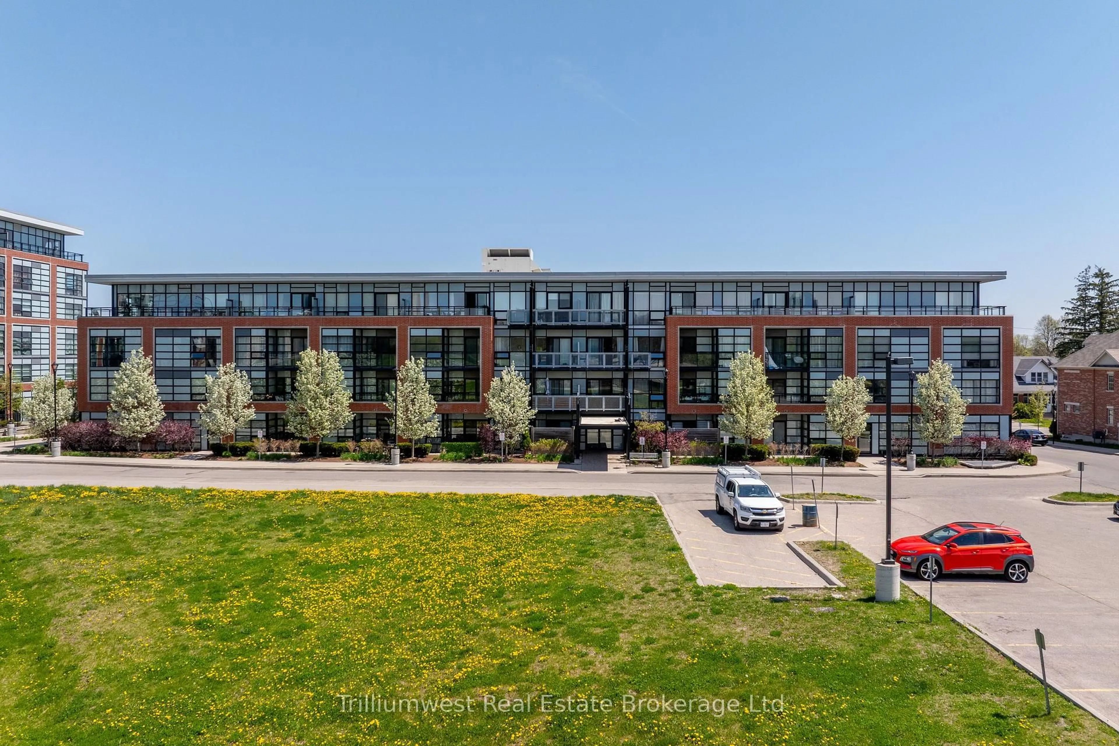 A pic from outside/outdoor area/front of a property/back of a property/a pic from drone, building for 155 St Leger St #412, Kitchener Ontario N2H 0B9