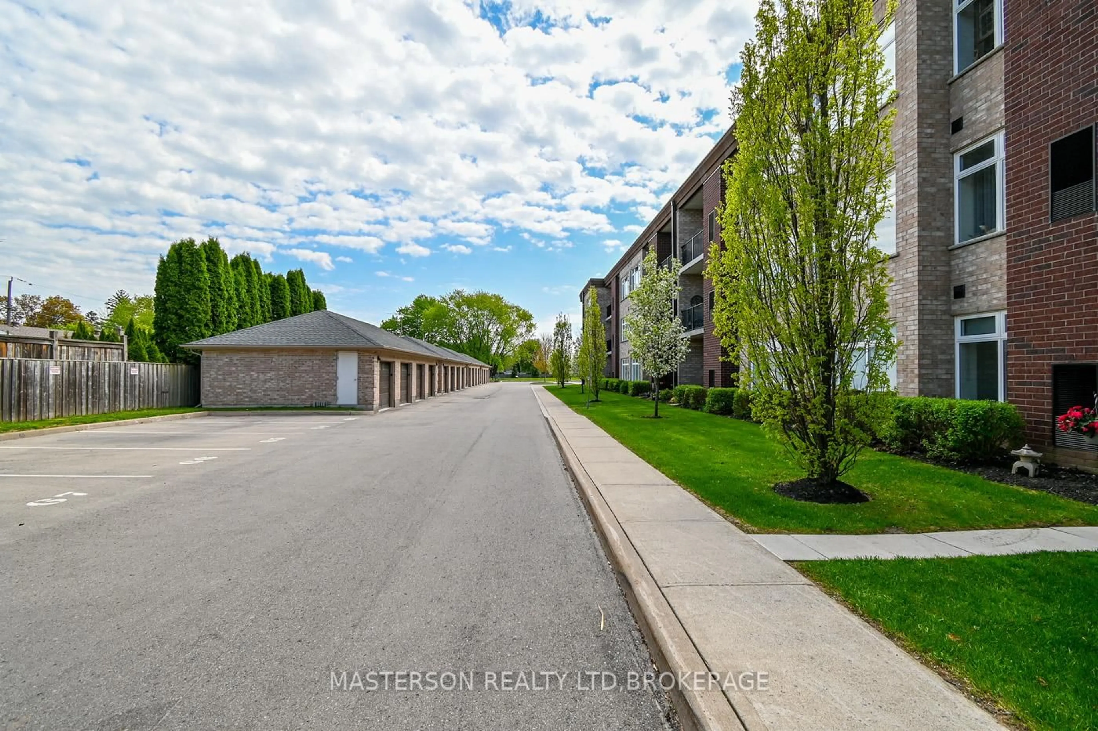 A pic from outside/outdoor area/front of a property/back of a property/a pic from drone, street for 4644 Pettit Ave #203, Niagara Falls Ontario L2E 6L5