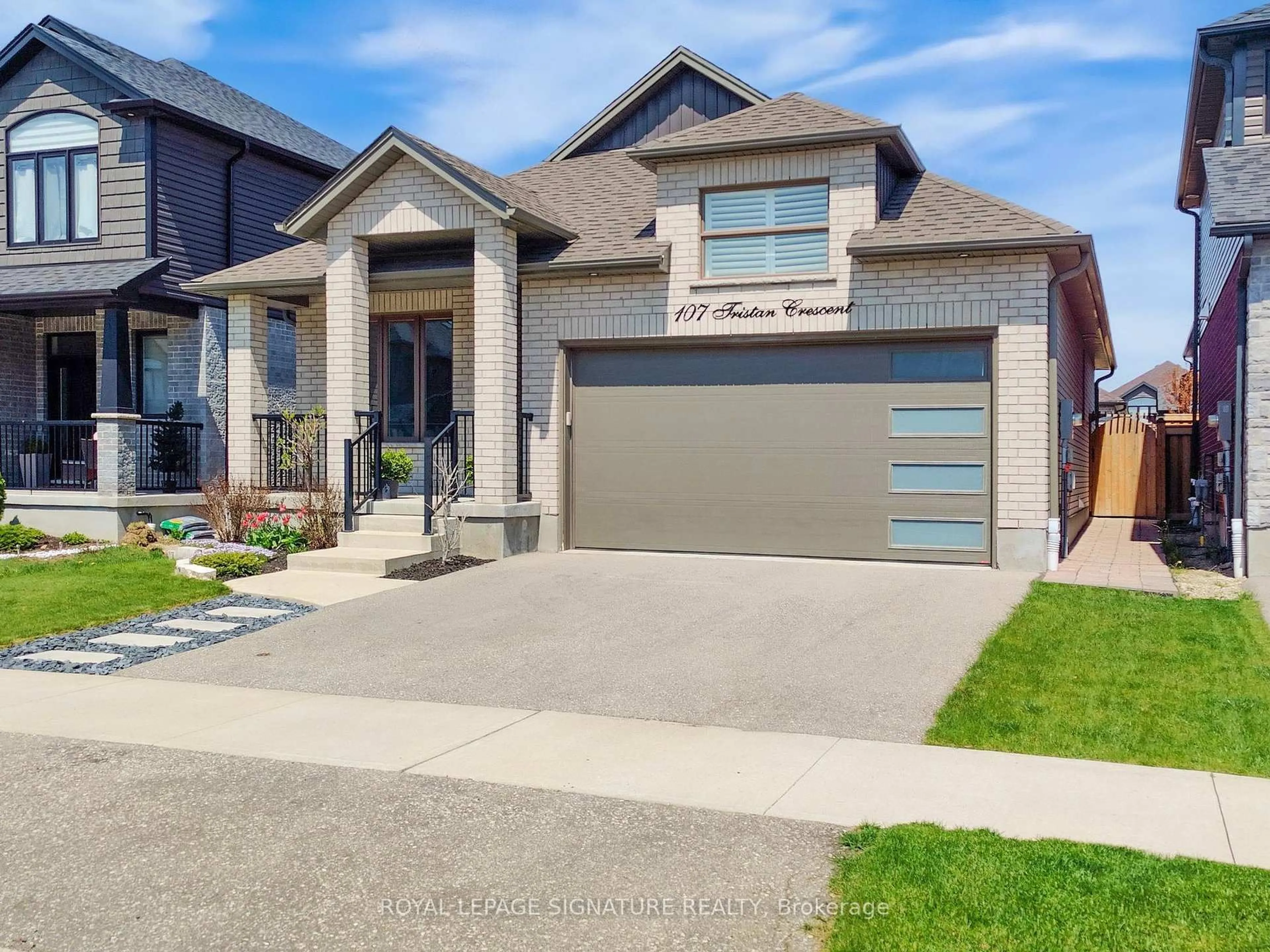 Home with brick exterior material, street for 107 Tristan Cres, Woolwich Ontario N0B 1M0