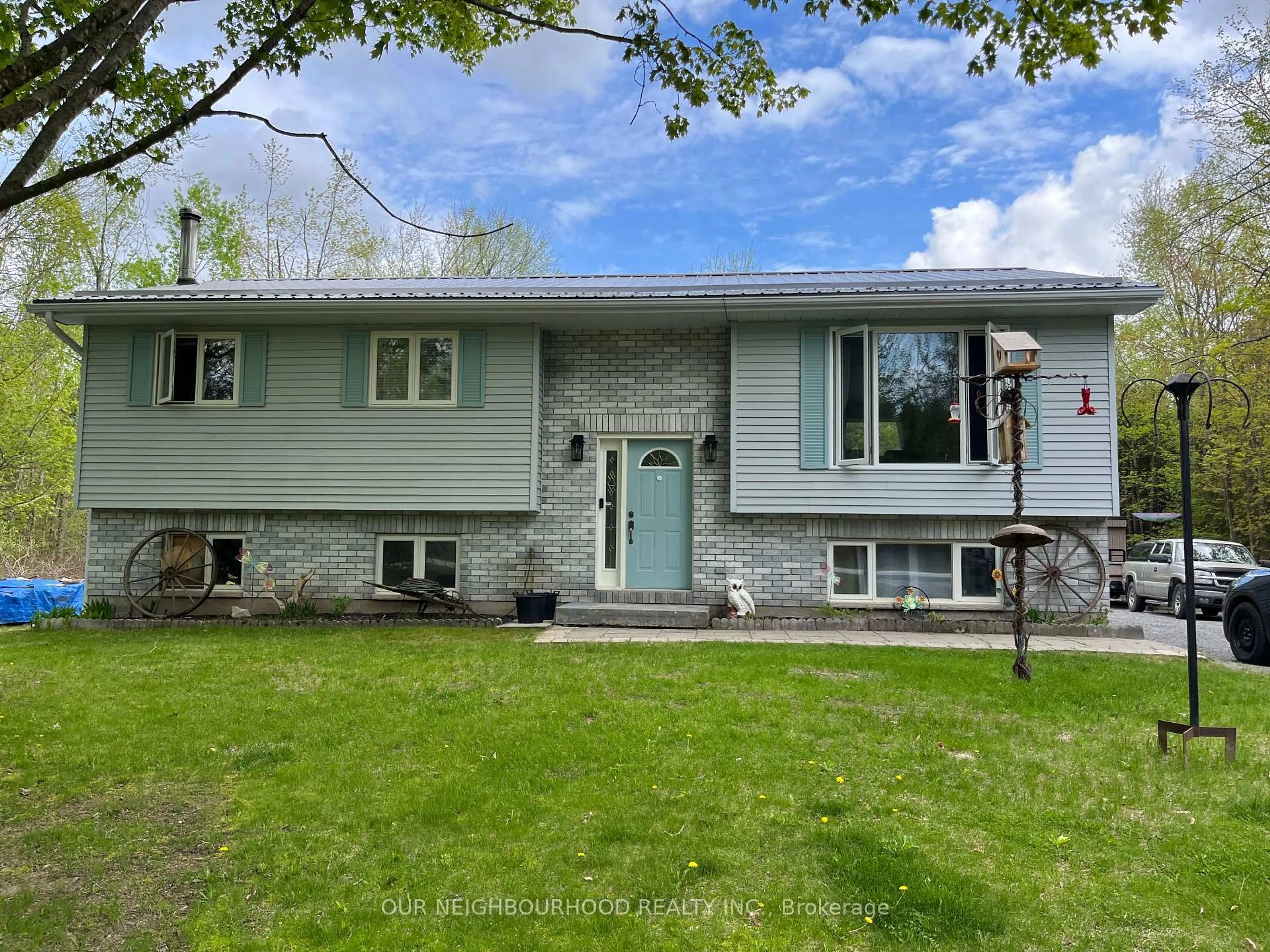 Home with vinyl exterior material, street for 47 Wood Rd, Madoc Ontario K0K 2K0