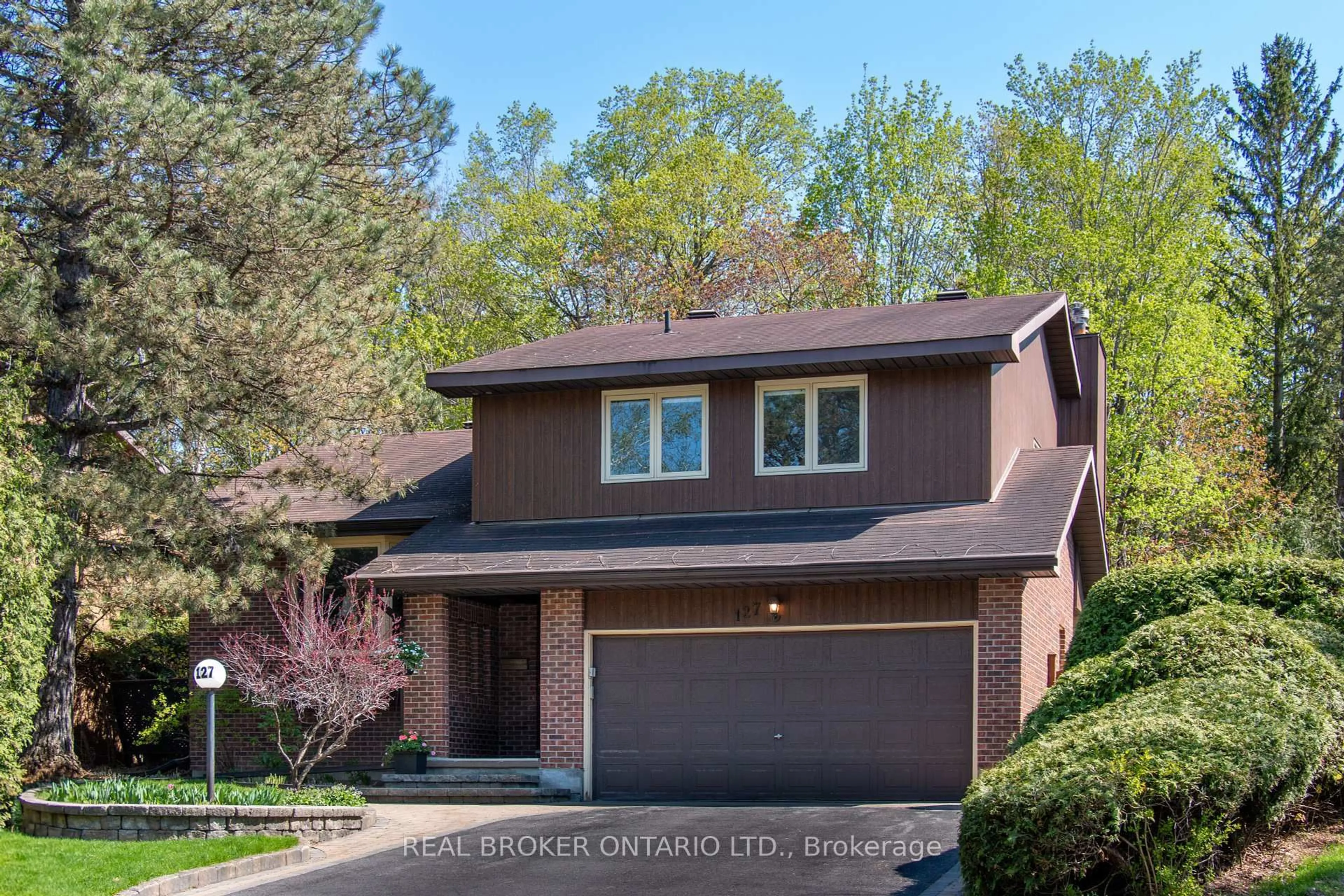 Home with brick exterior material, street for 127 Chimo Dr, Kanata Ontario K2L 2G7