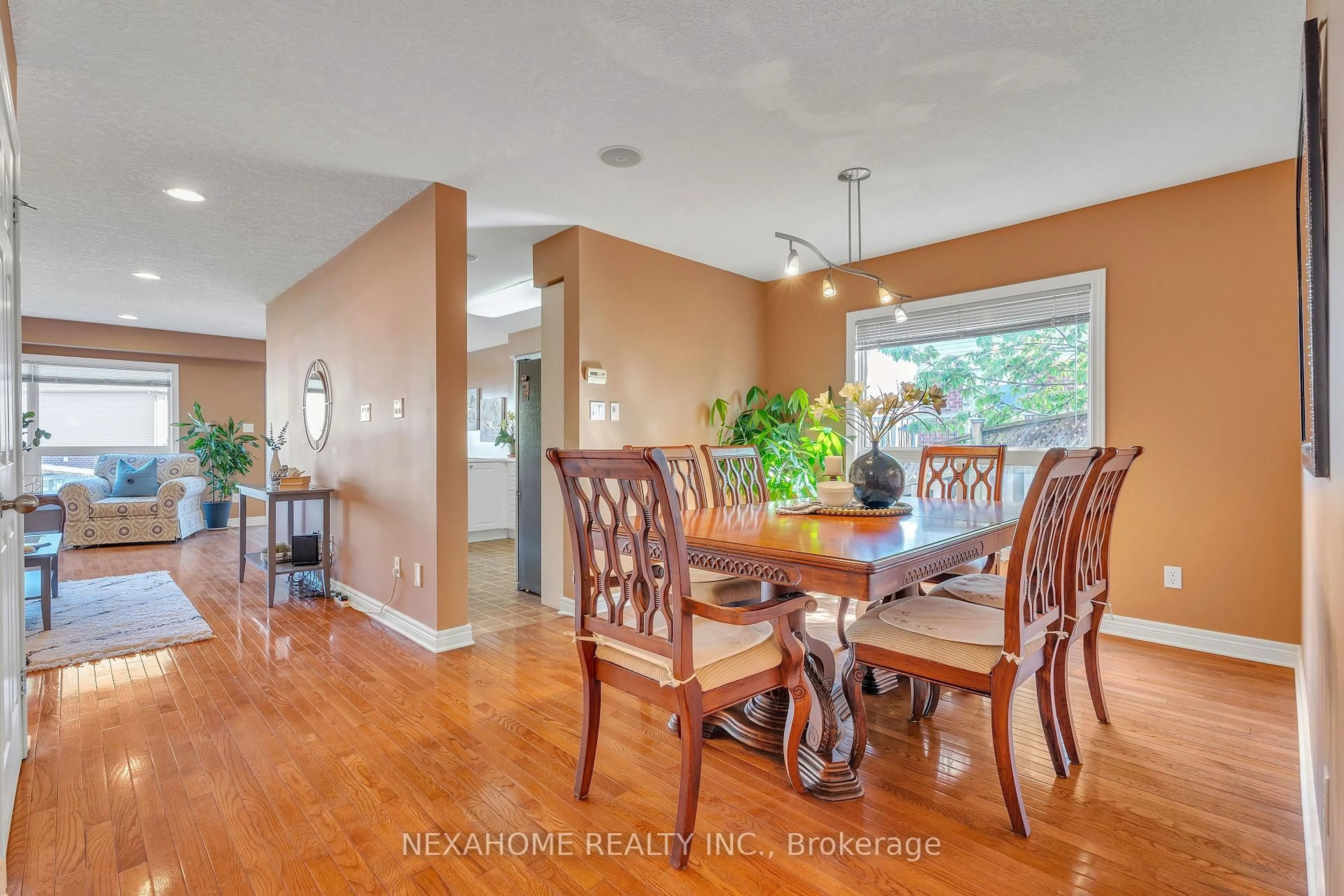 Dining room, wood/laminate floor for 565 Thistlewood Dr, London North Ontario N5X 4M1