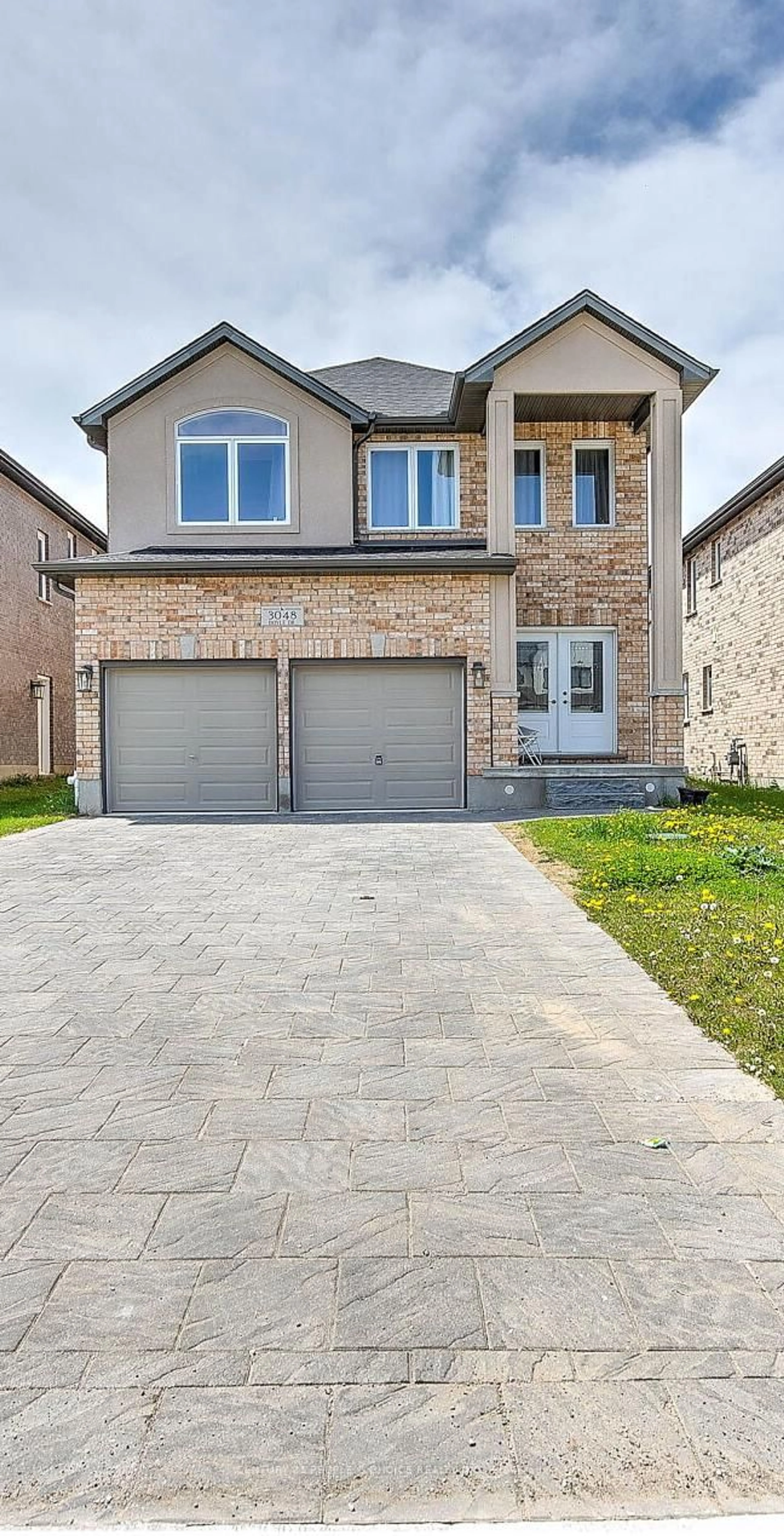 Home with brick exterior material, street for 3048 Doyle Dr, London South Ontario N6M 0G9
