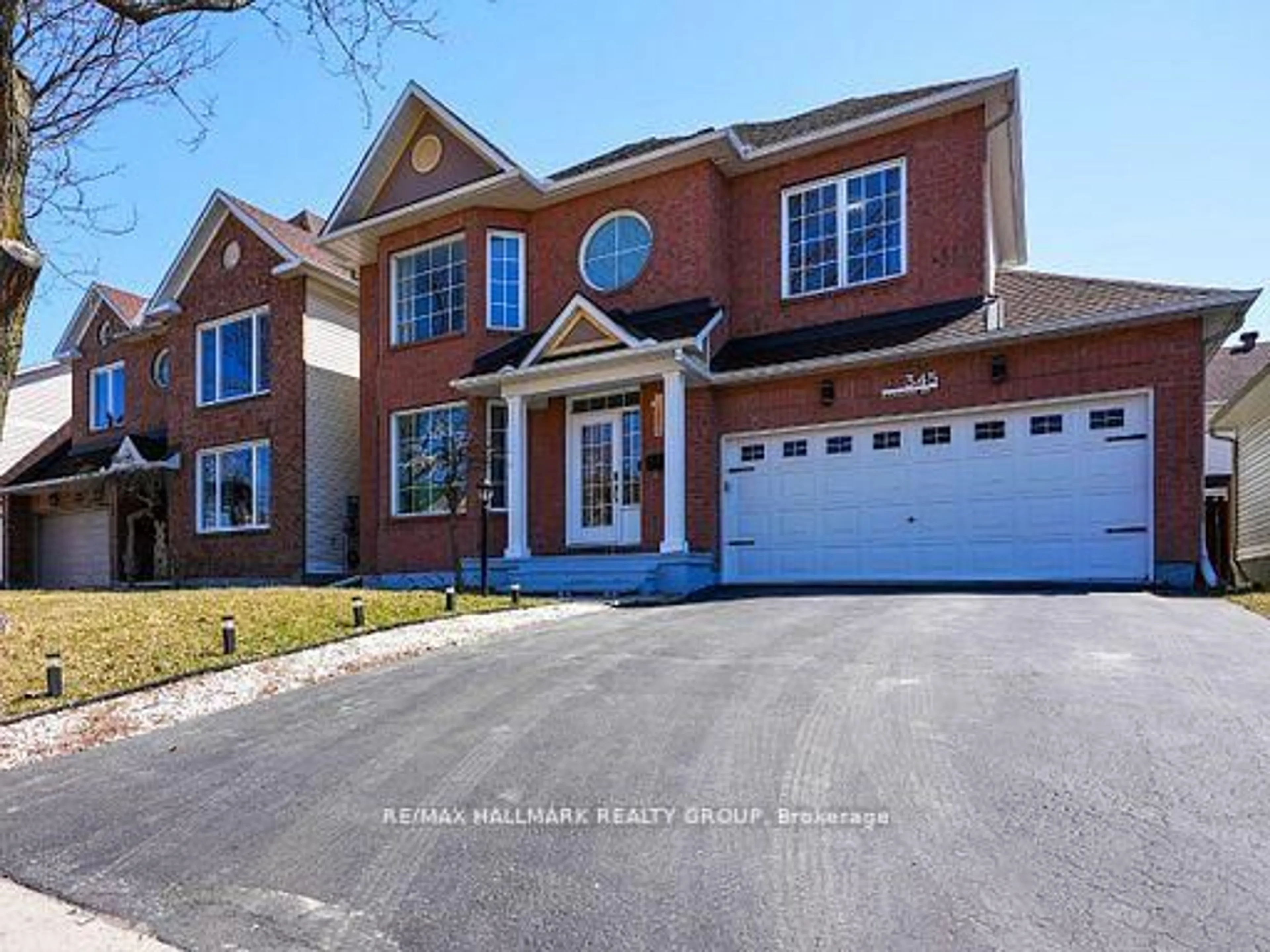 Home with brick exterior material, street for 345 Stoneway Dr, Ottawa Ontario K2G 6G8