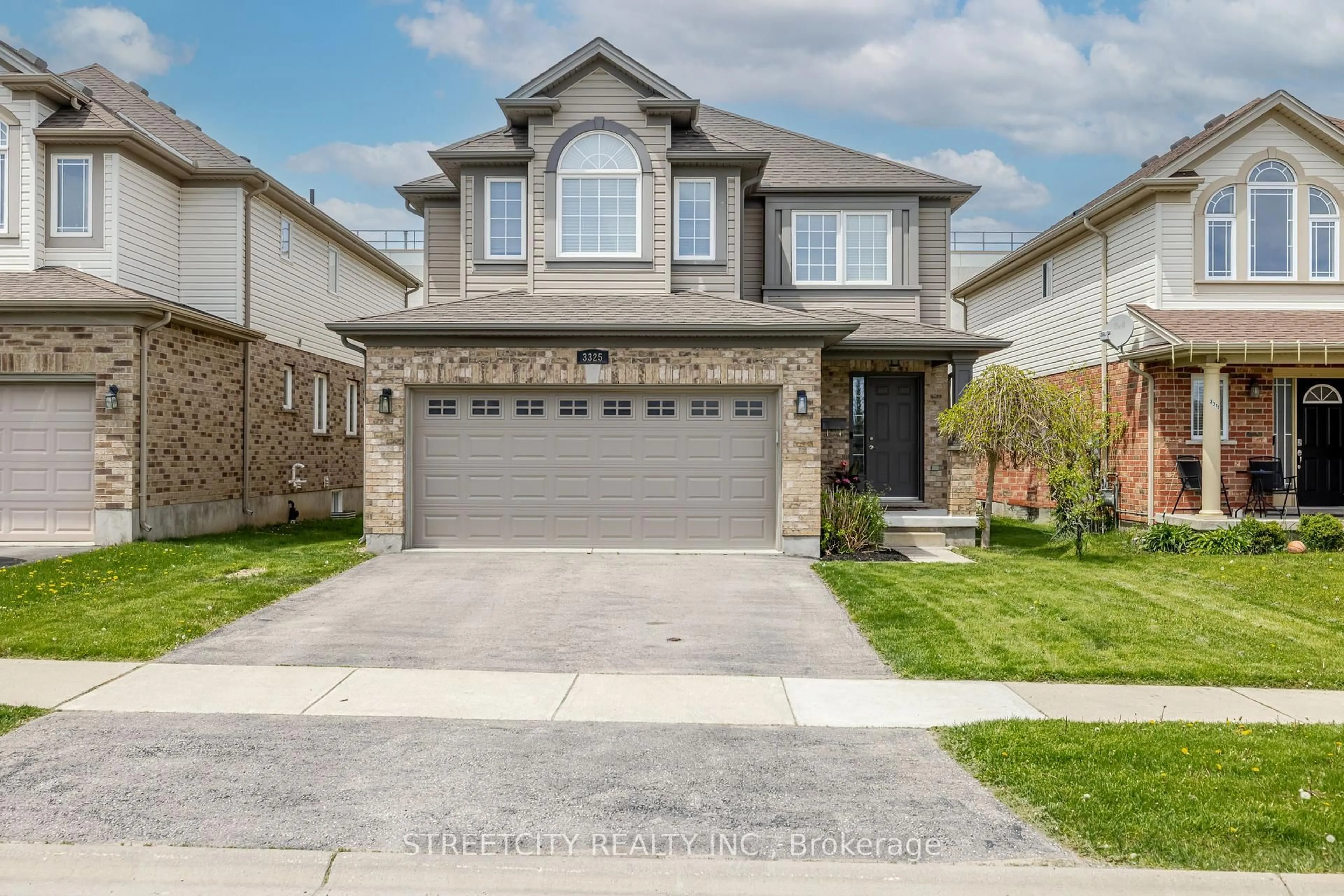 Home with brick exterior material, street for 3325 Emilycarr Lane, London South Ontario N6L 0A3
