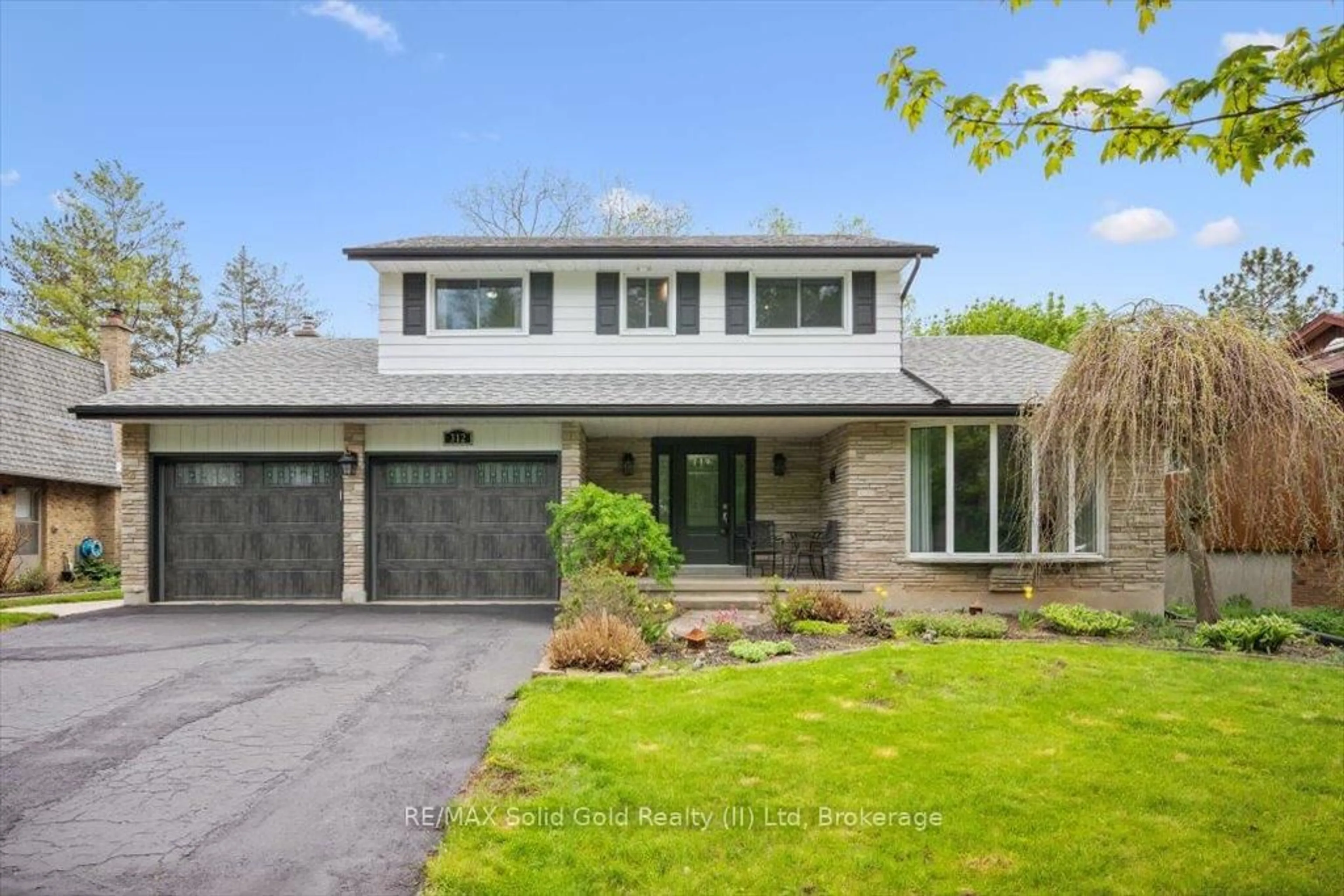 Home with brick exterior material, street for 312 Craigleith Dr, Waterloo Ontario N2L 5B3
