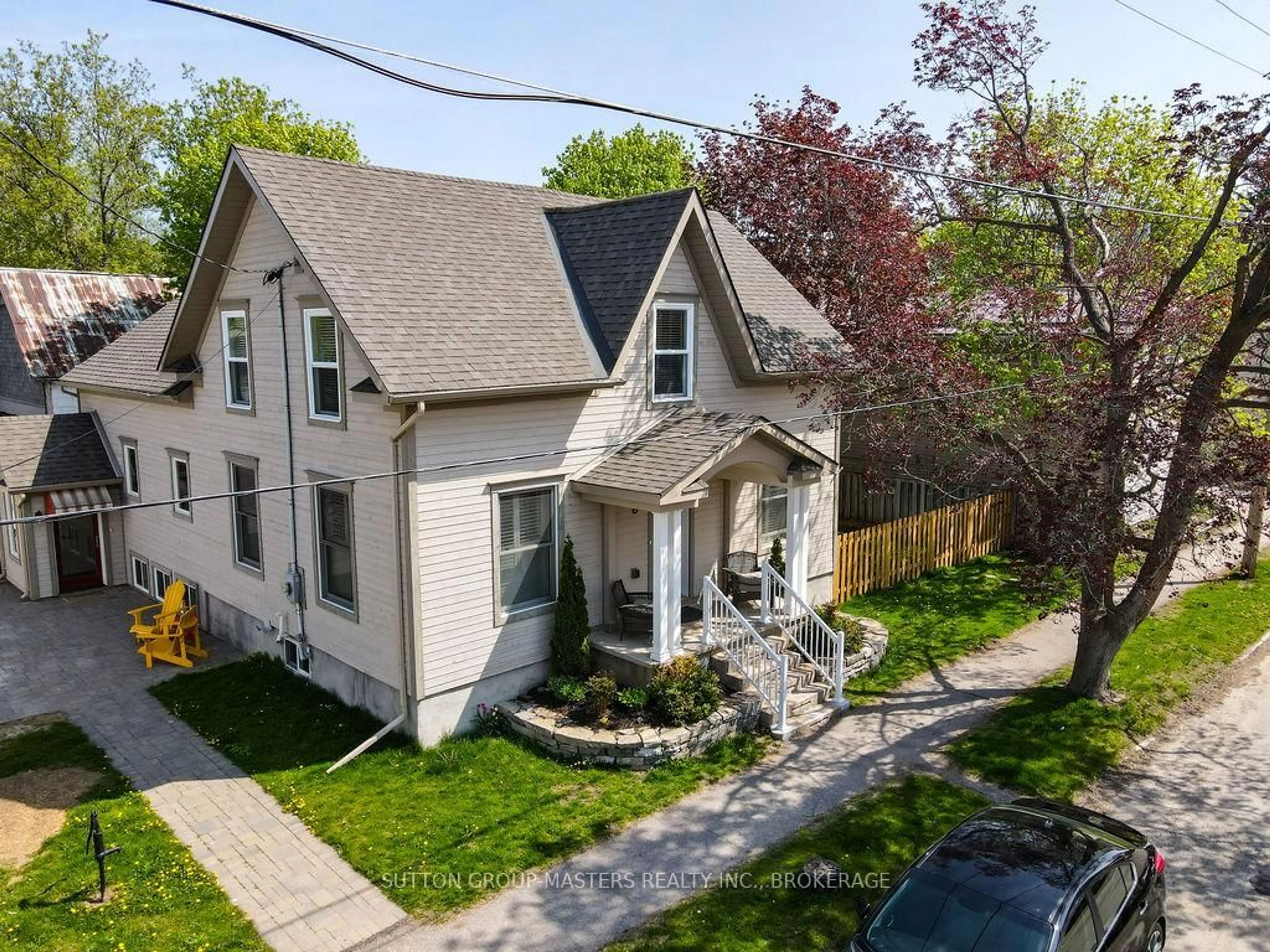 A pic from outside/outdoor area/front of a property/back of a property/a pic from drone, street for 8 Spring St, Westport Ontario K0G 1X0