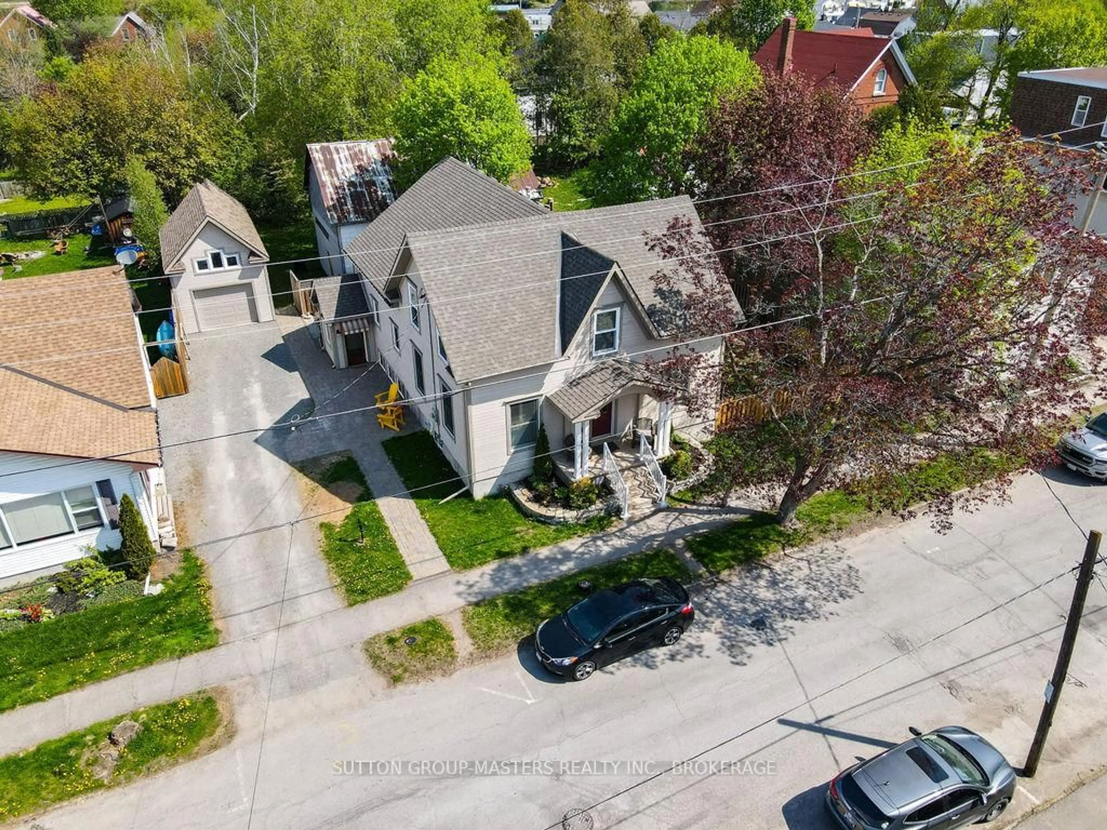 A pic from outside/outdoor area/front of a property/back of a property/a pic from drone, street for 8 Spring St, Westport Ontario K0G 1X0