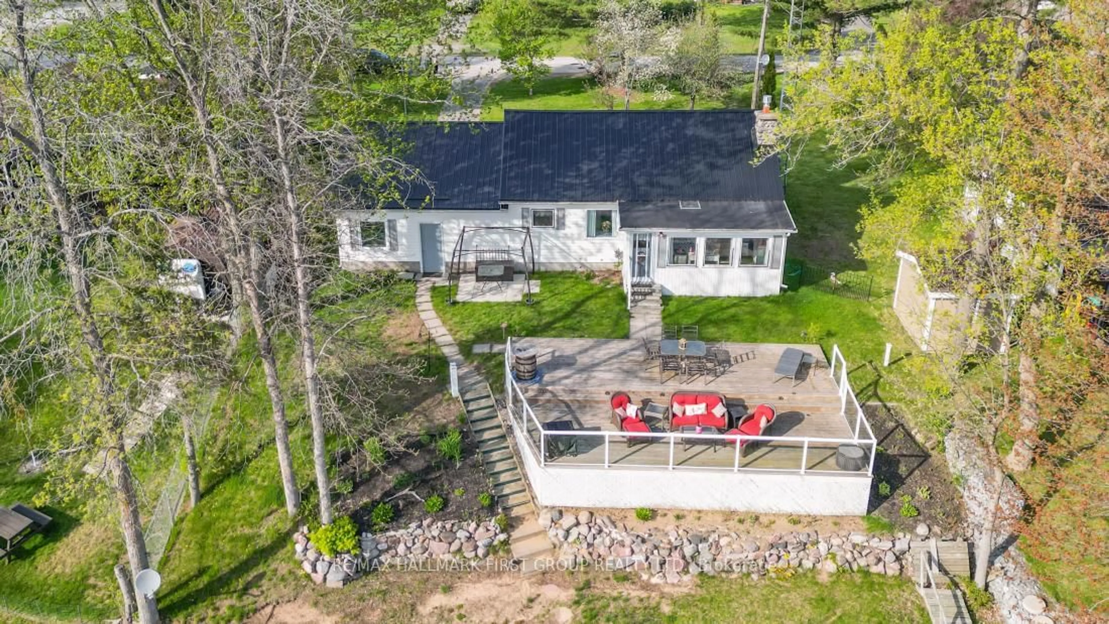 A pic from outside/outdoor area/front of a property/back of a property/a pic from drone, water/lake/river/ocean view for 96 Charles Rd, Tweed Ontario K0K 3J0