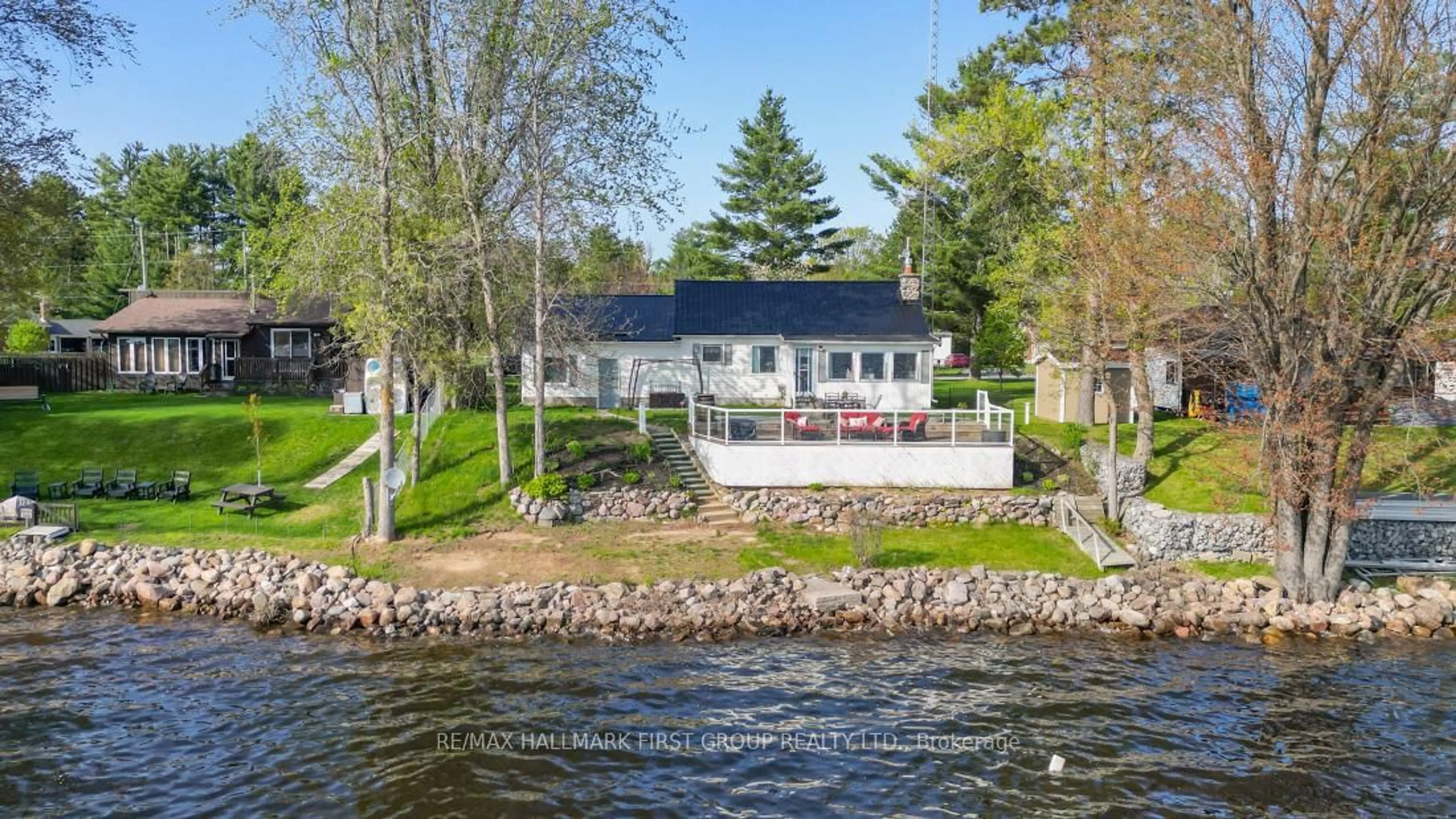 A pic from outside/outdoor area/front of a property/back of a property/a pic from drone, water/lake/river/ocean view for 96 Charles Rd, Tweed Ontario K0K 3J0