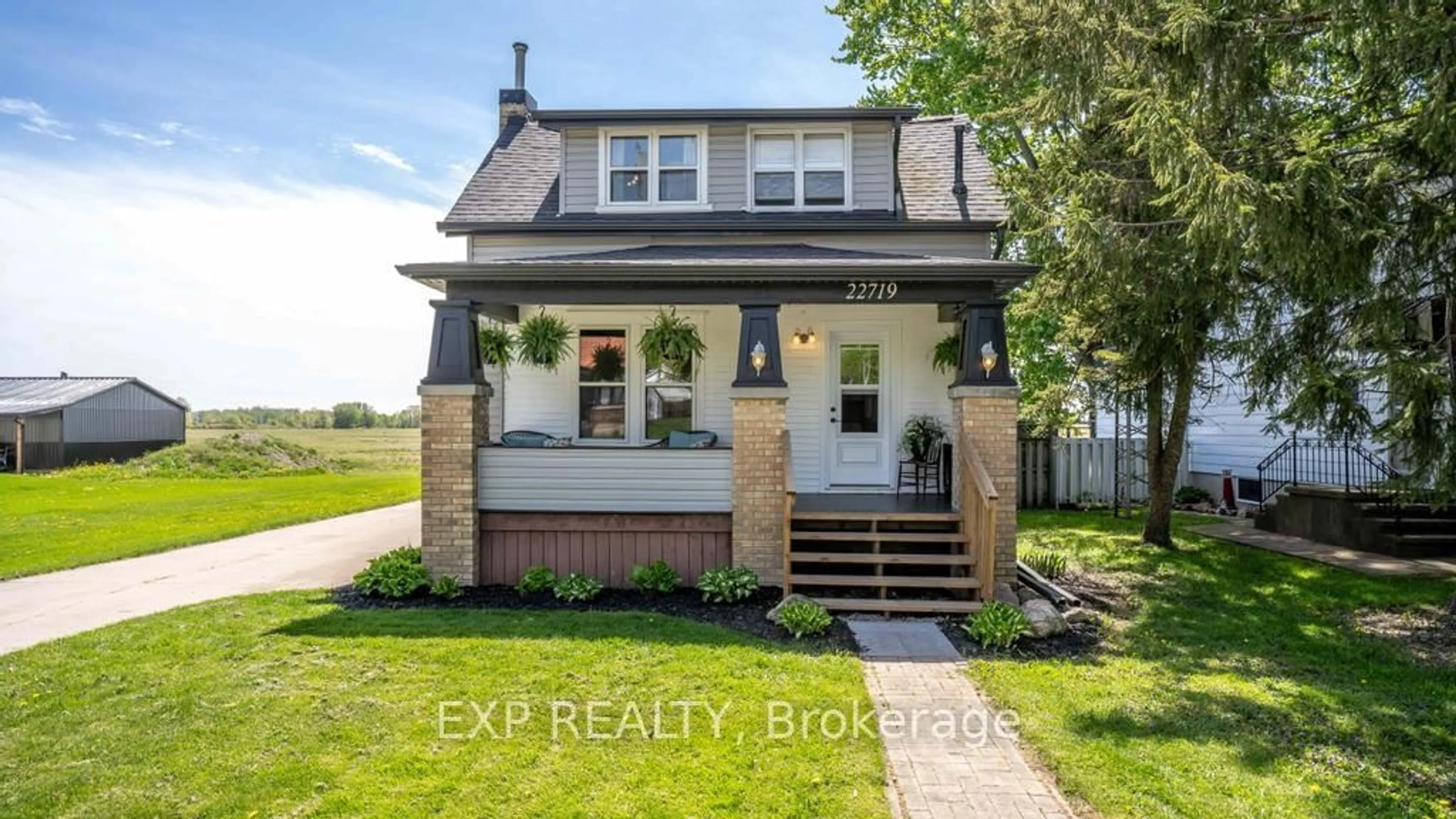 Home with brick exterior material, street for 22719 Thames Rd, Southwest Middlesex Ontario N0L 1A0