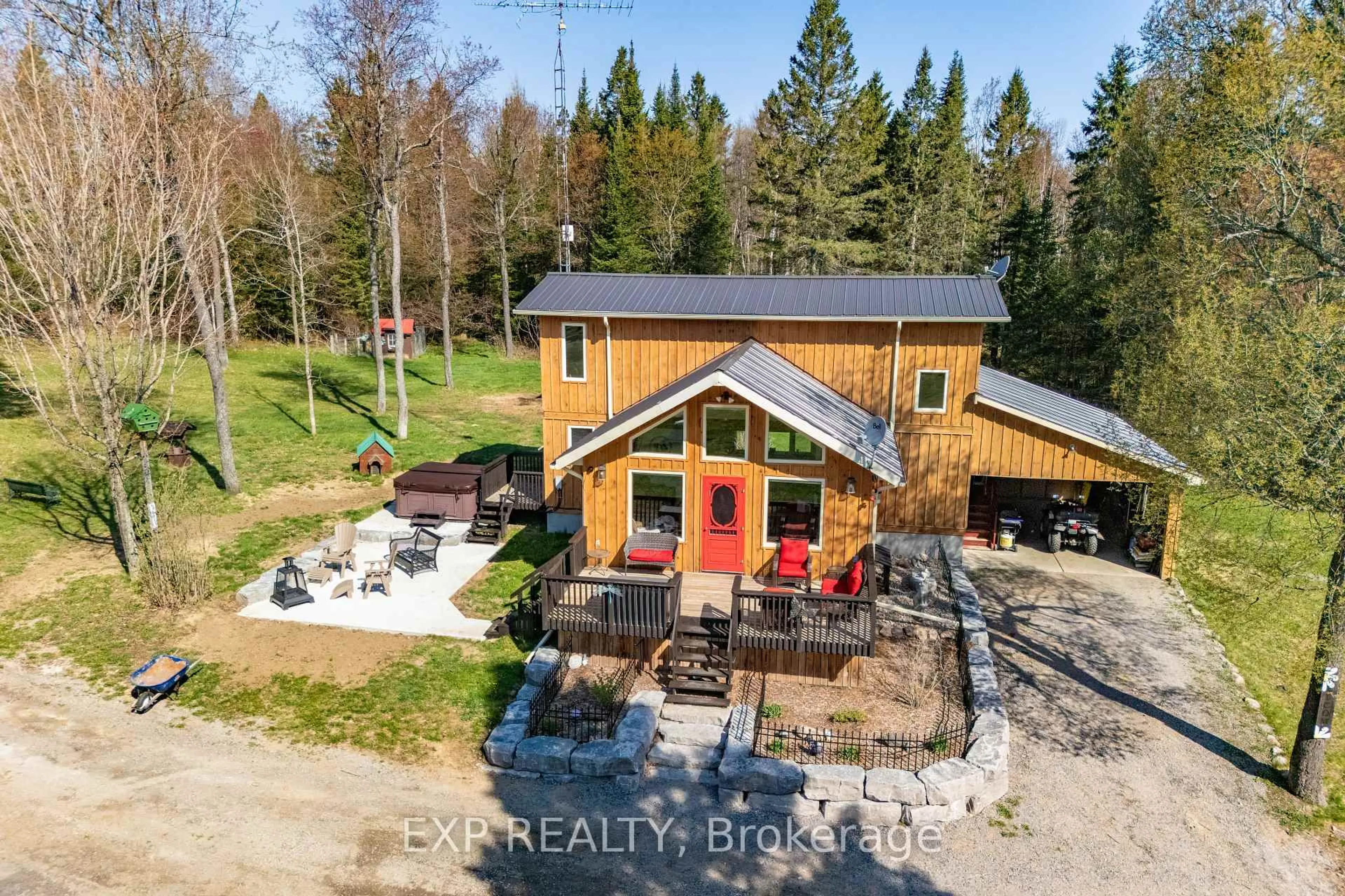 A pic from outside/outdoor area/front of a property/back of a property/a pic from drone, building for 5490 Loop Rd, Highlands East Ontario K0L 2A0