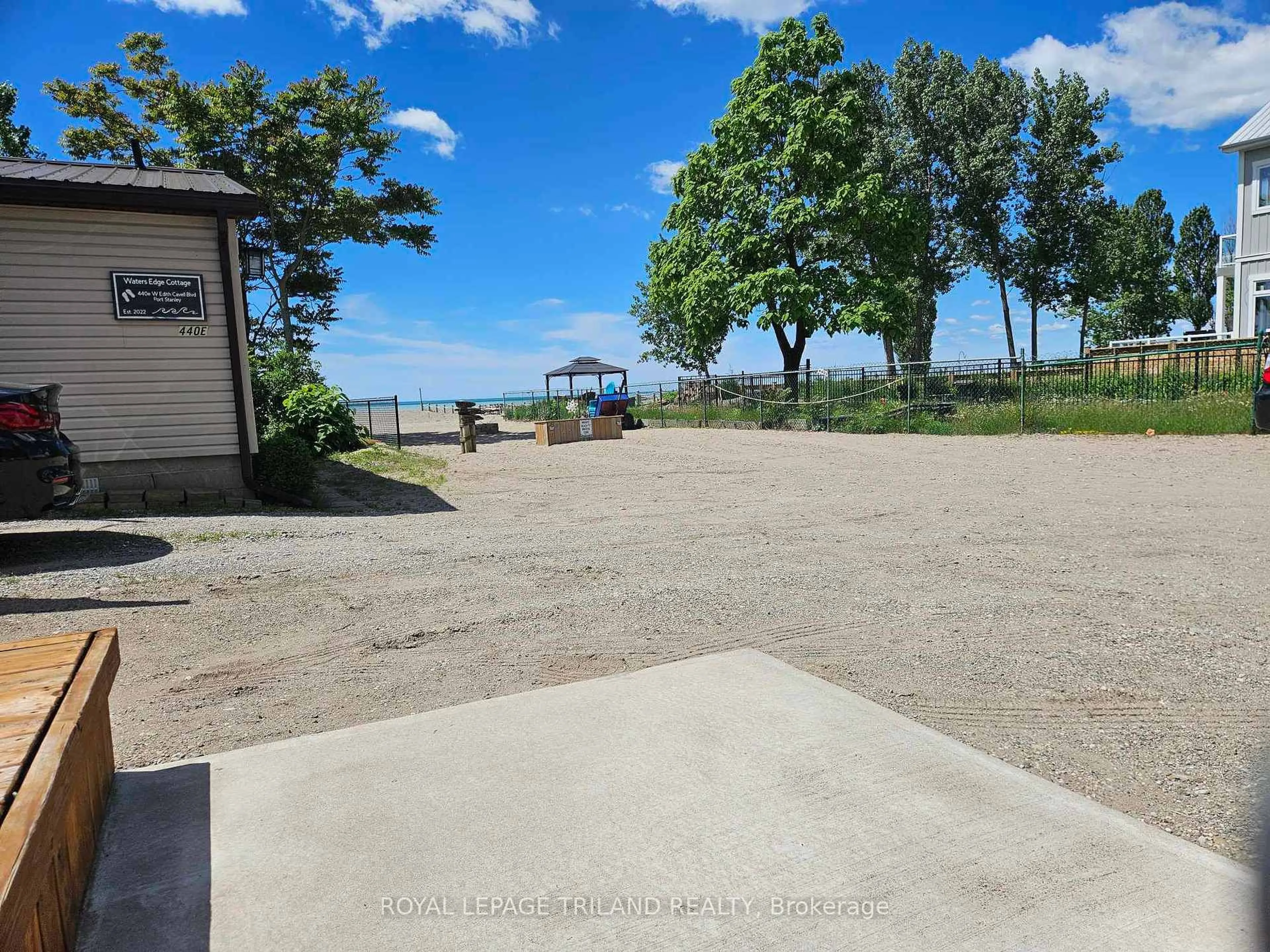 A pic from outside/outdoor area/front of a property/back of a property/a pic from drone, water/lake/river/ocean view for 440 West Edith Cavell Blvd #D, Central Elgin Ontario N5L 1G8