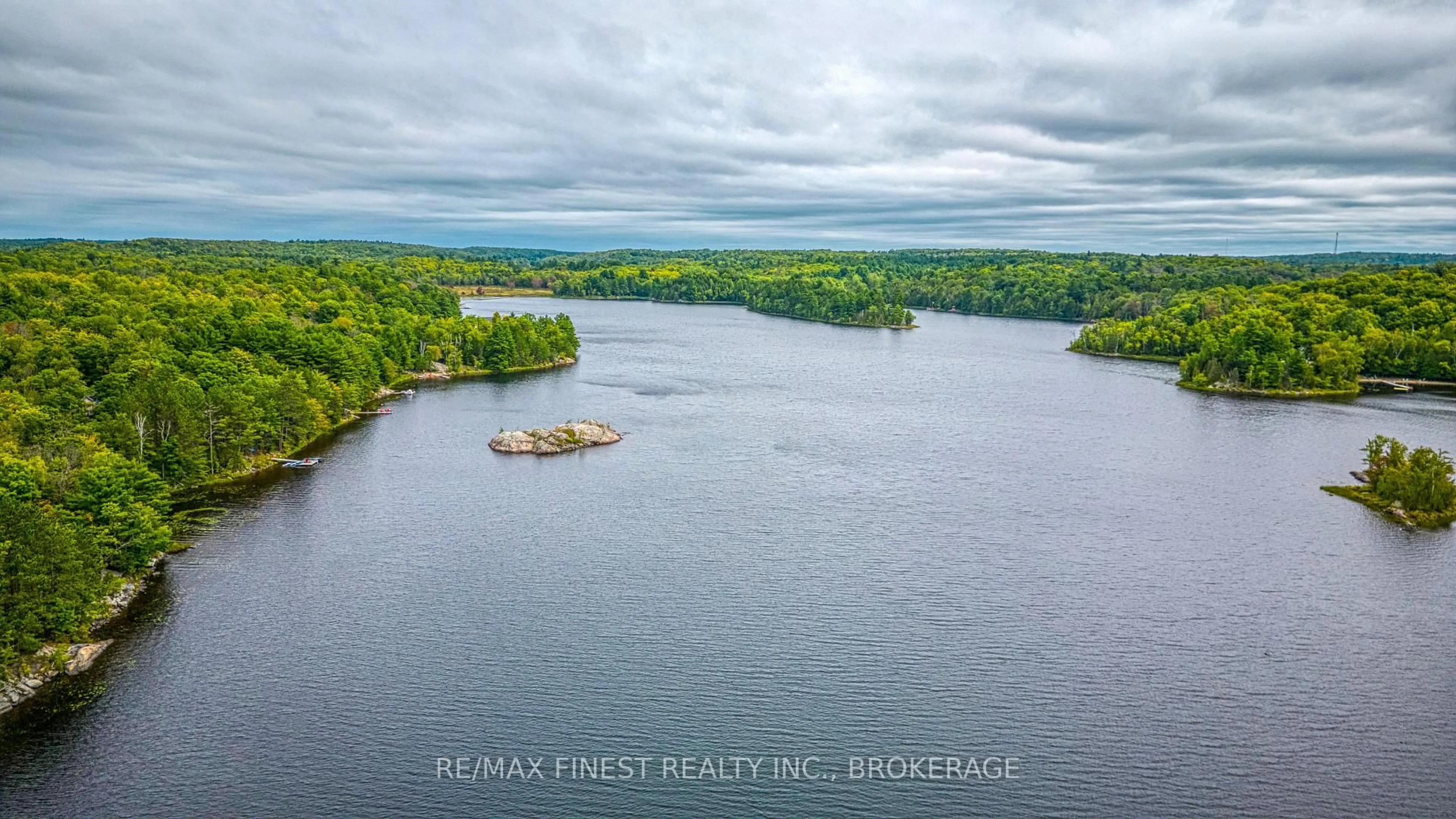 A pic from outside/outdoor area/front of a property/back of a property/a pic from drone, water/lake/river/ocean view for 1602 Baker Valley Rd, Arden Ontario K0H 1B0