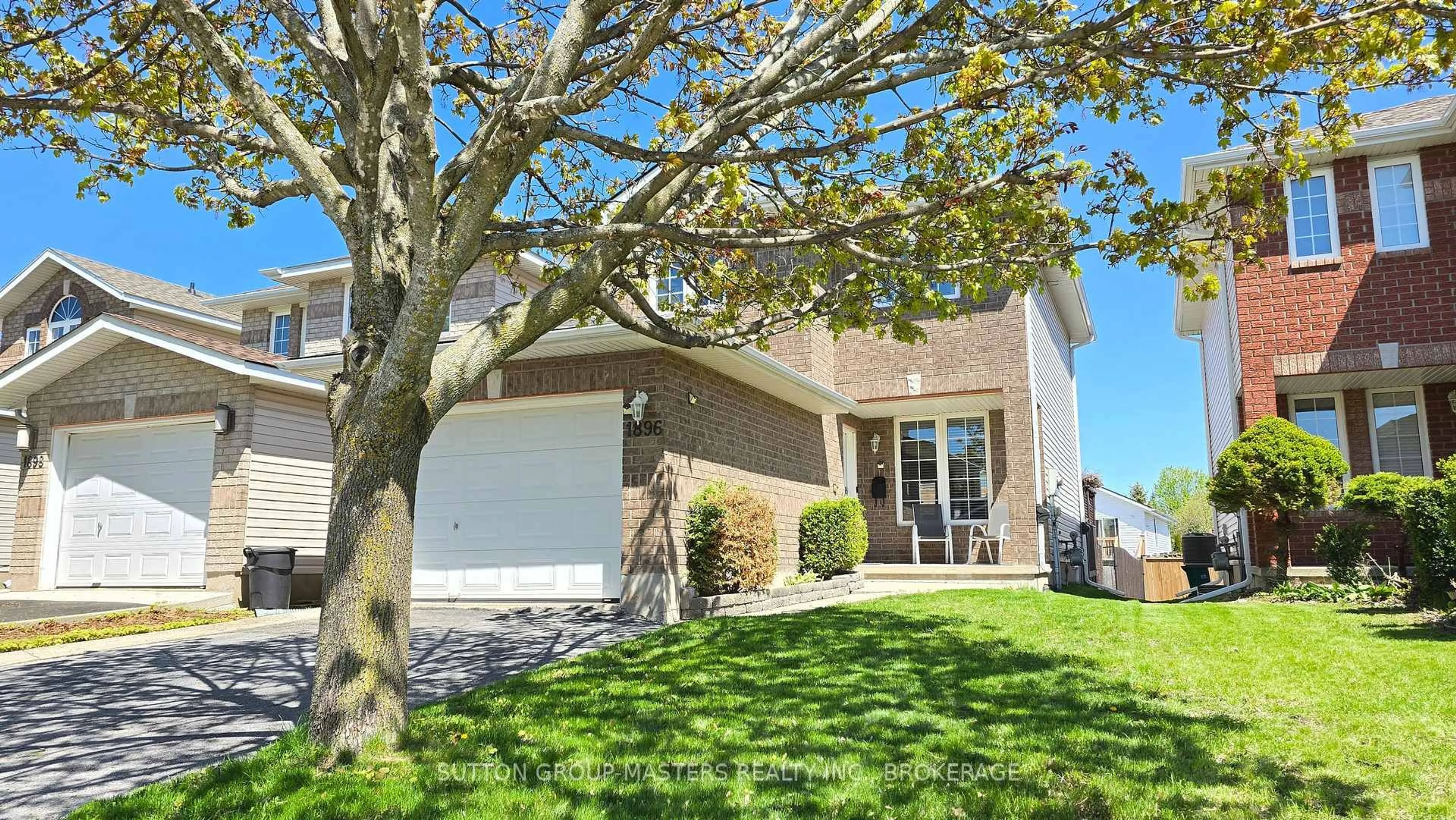 Home with vinyl exterior material, street for 1896 Berrywood Cres, Kingston Ontario K7P 3G4