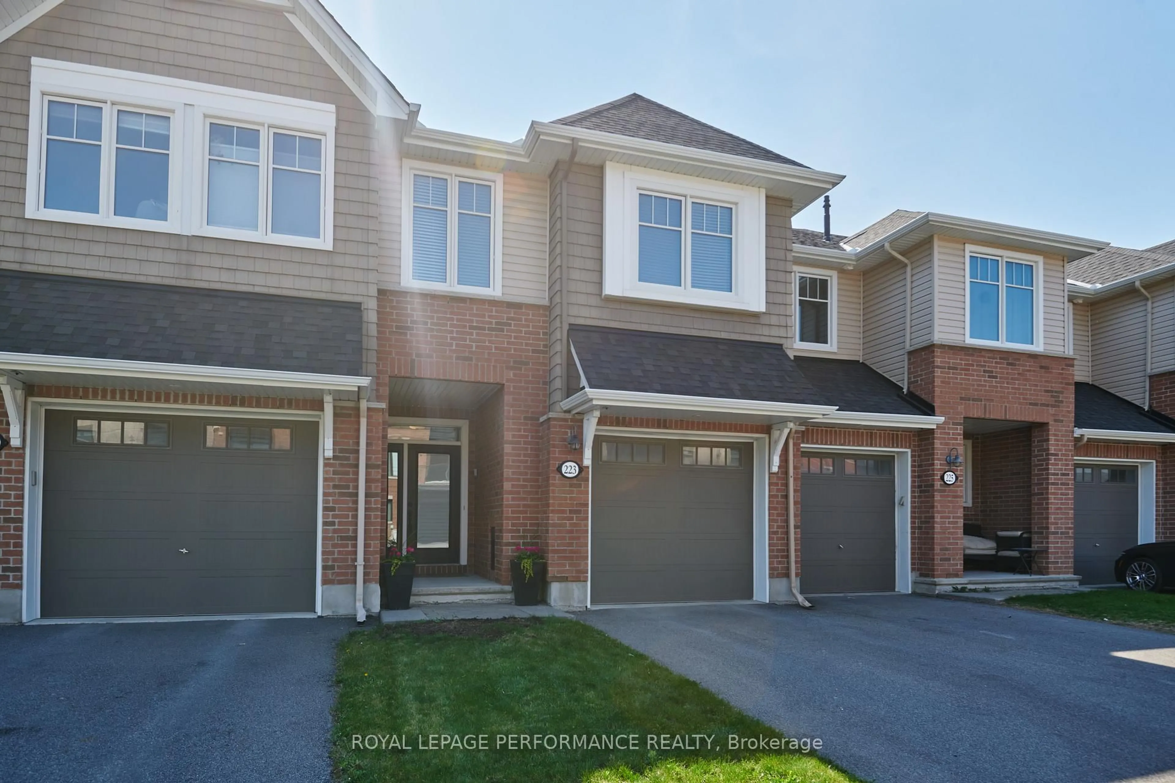 Home with brick exterior material, street for 223 Hawkmere Way, Ottawa Ontario K1T 0R5