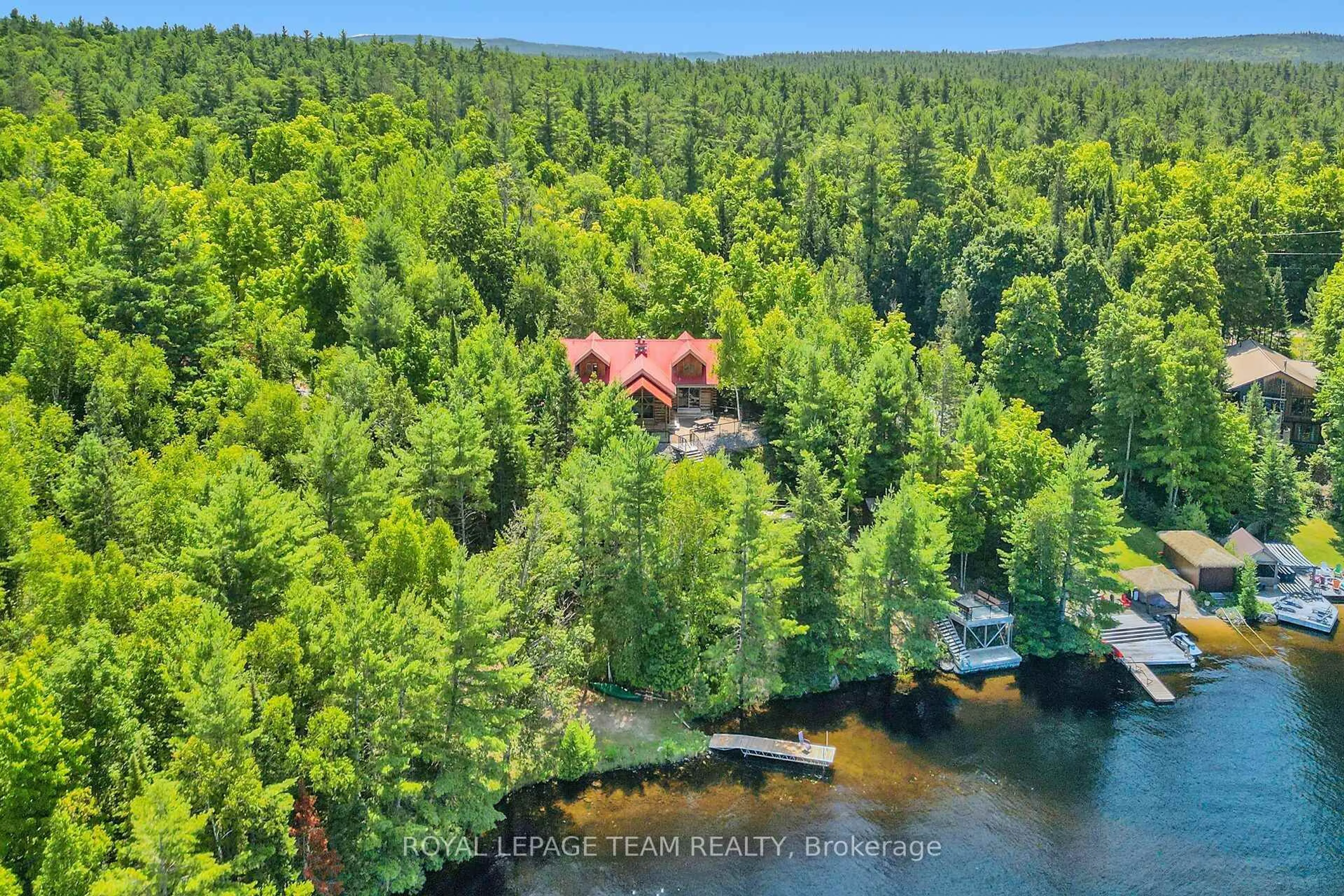 A pic from outside/outdoor area/front of a property/back of a property/a pic from drone, water/lake/river/ocean view for 38 BONNER Rd, Calabogie Ontario K0J 1H0