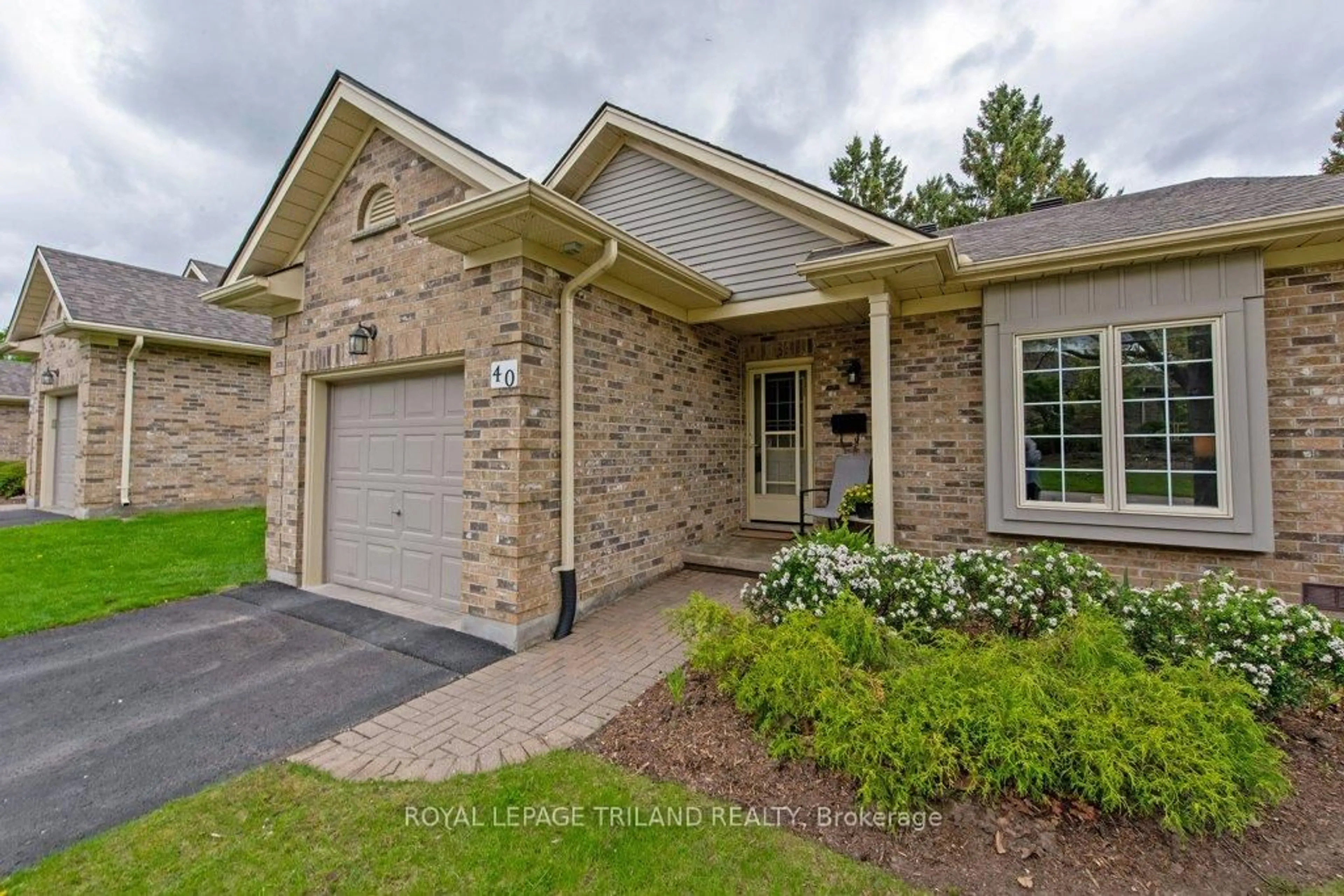 Home with brick exterior material, street for 1241 Hamilton Rd #40, London East Ontario N5W 6B3