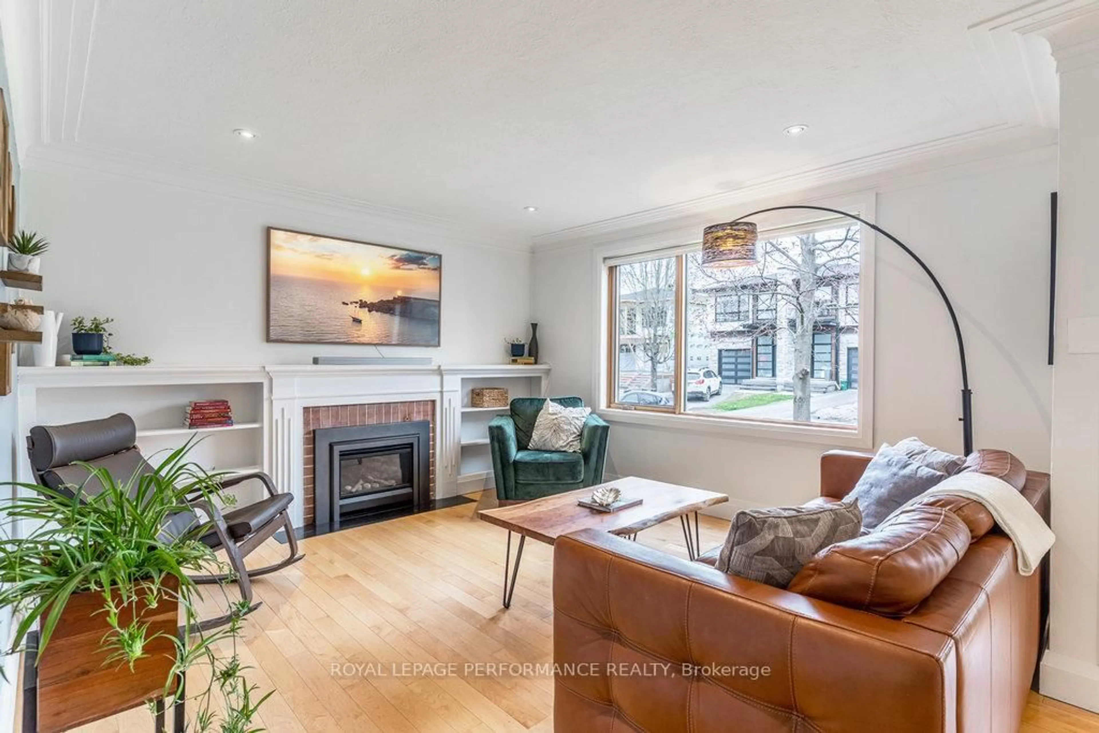 Living room with furniture, wood/laminate floor for 462 Dawson Ave, Ottawa Ontario K1Z 5V7