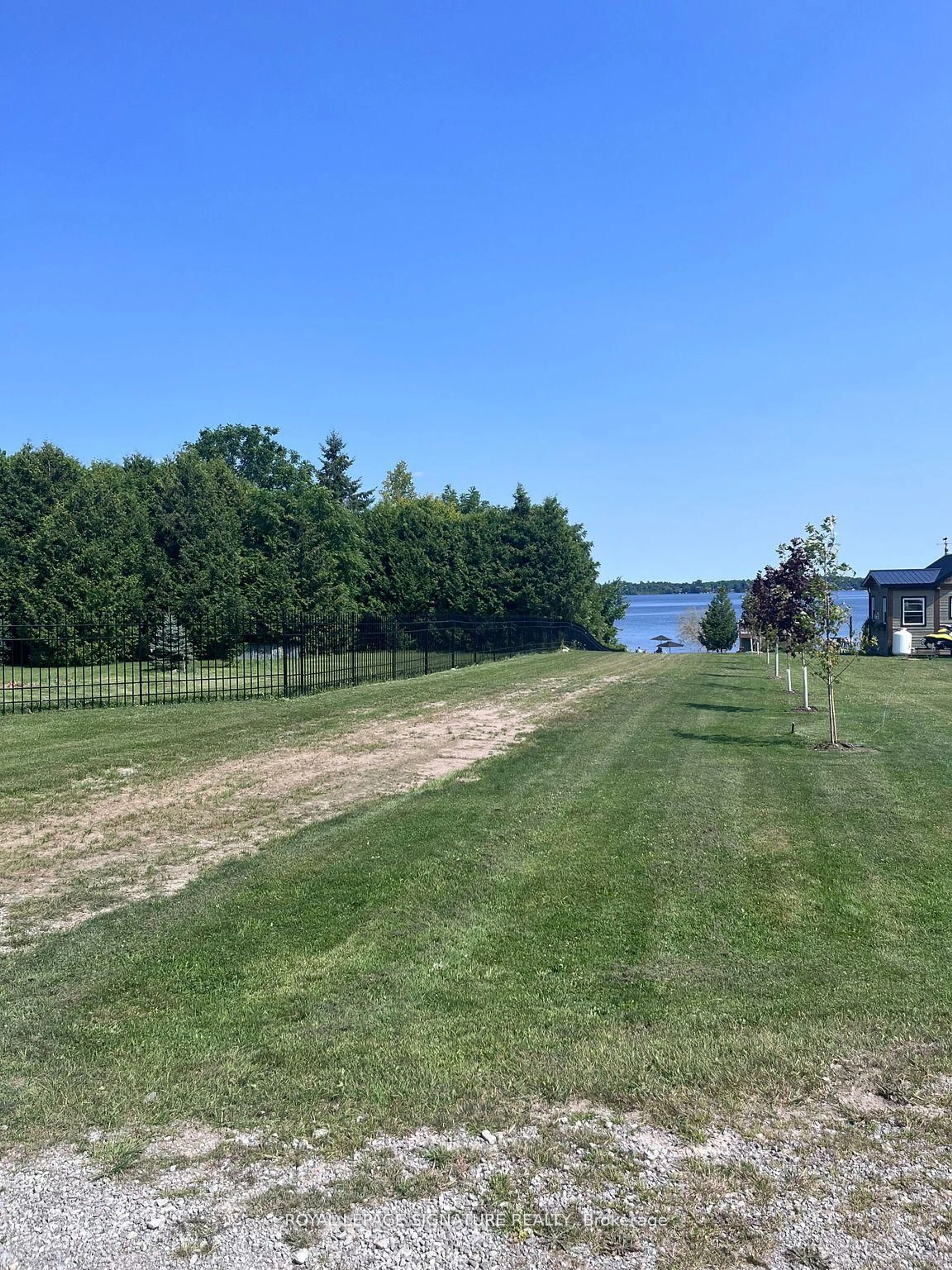 A pic from outside/outdoor area/front of a property/back of a property/a pic from drone, water/lake/river/ocean view for 31 Blue Bay Lane, Kawartha Lakes Ontario K0M 1N0