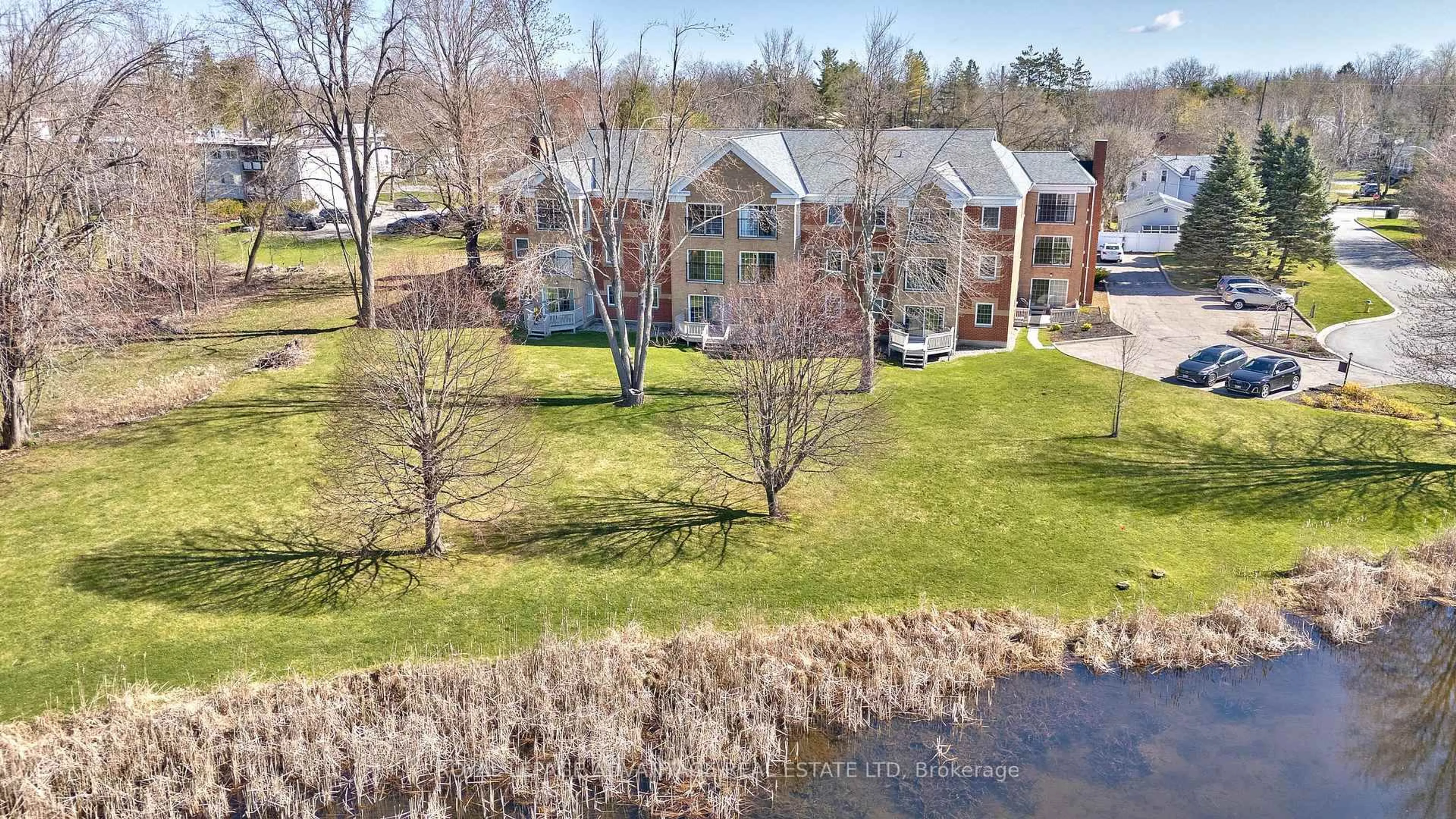 A pic from outside/outdoor area/front of a property/back of a property/a pic from drone, water/lake/river/ocean view for 19 JOHN St #203, Perth Ontario K7H 1T8