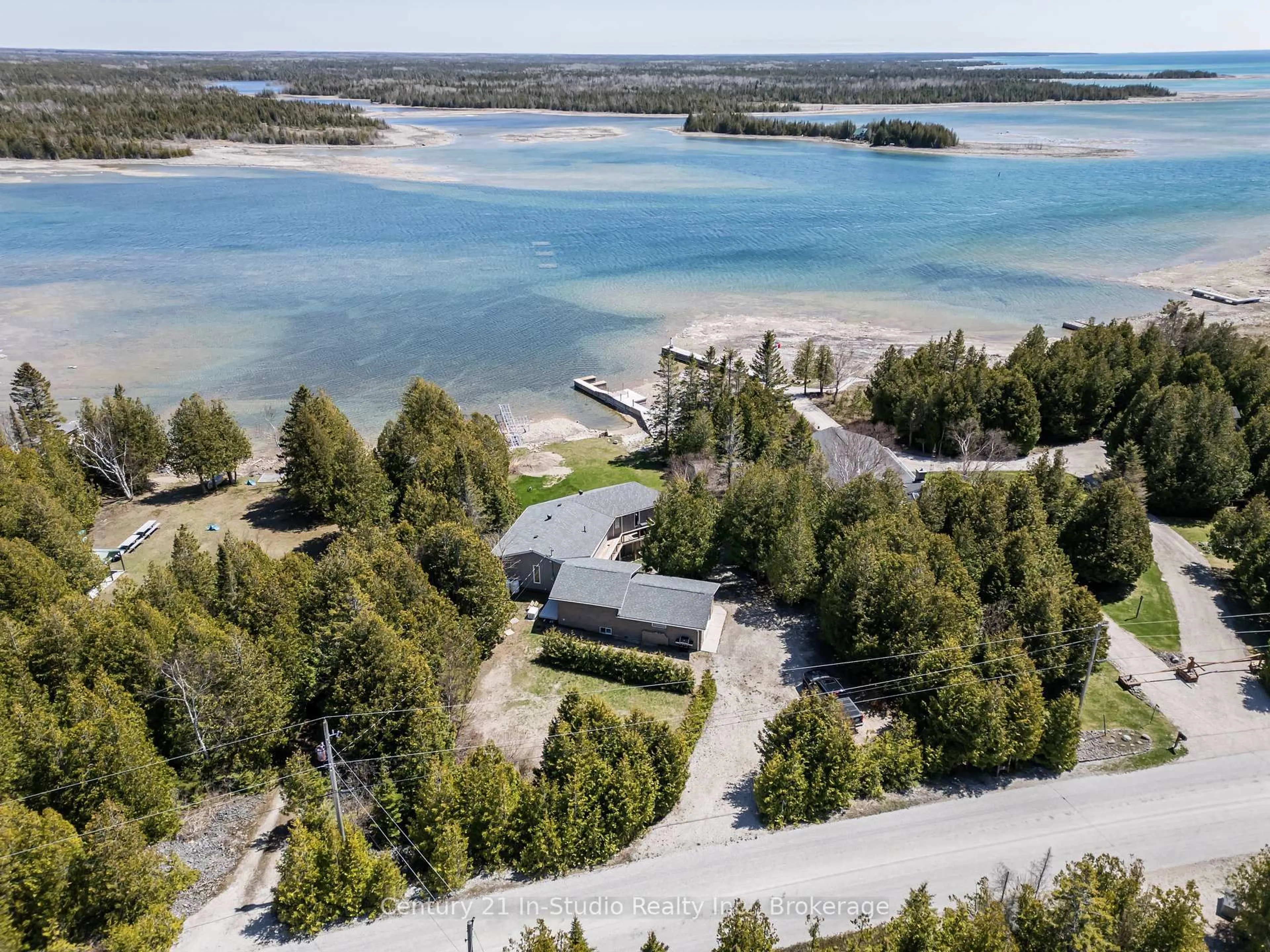 A pic from outside/outdoor area/front of a property/back of a property/a pic from drone, water/lake/river/ocean view for 119 Pine Tree Harbour Rd, Northern Bruce Peninsula Ontario N0H 1Z0