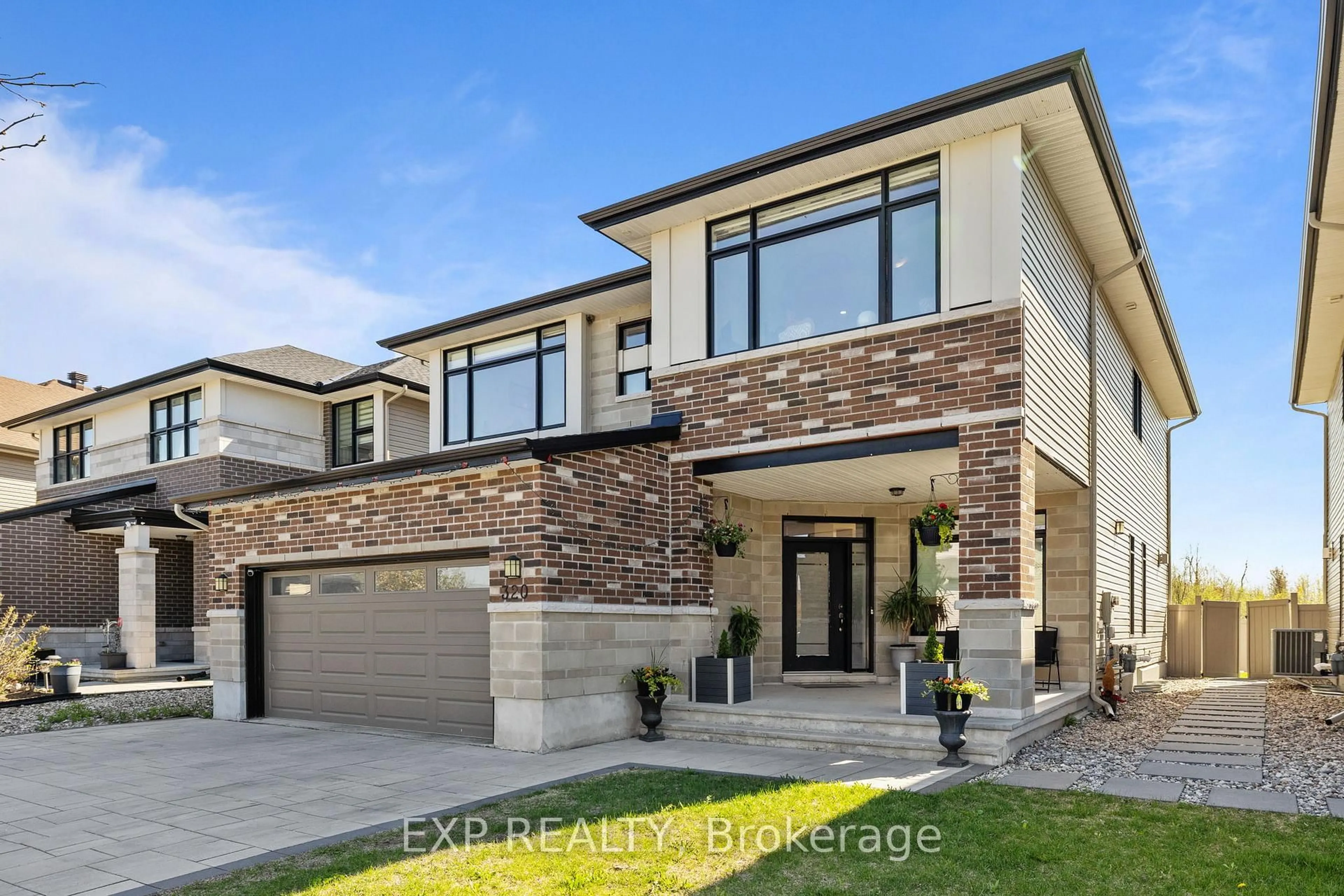 Home with brick exterior material, street for 320 Serenade Cres, Ottawa Ontario K1X 0B9