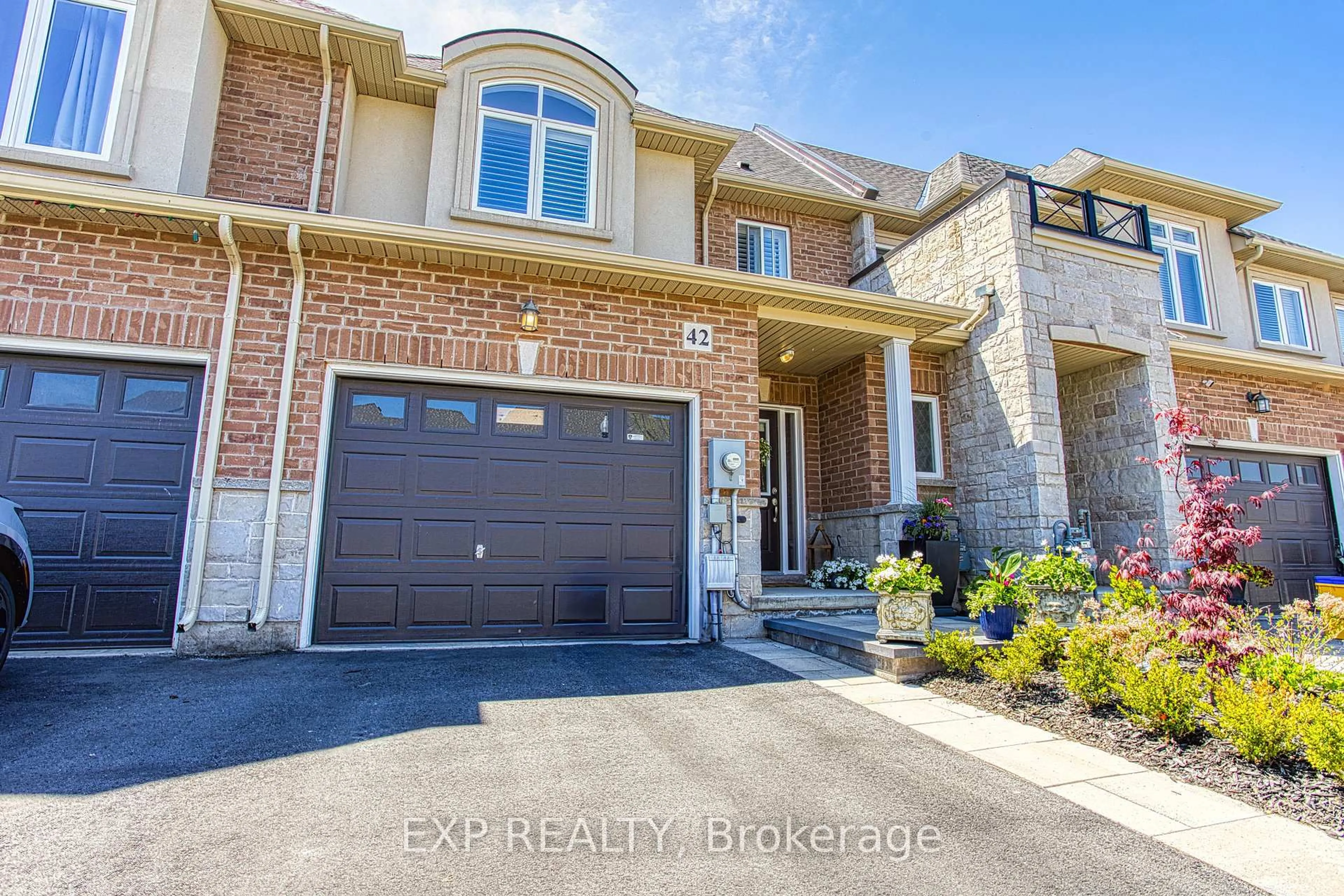 Home with brick exterior material, street for 42 Pinot Cres, Hamilton Ontario L8E 0J8