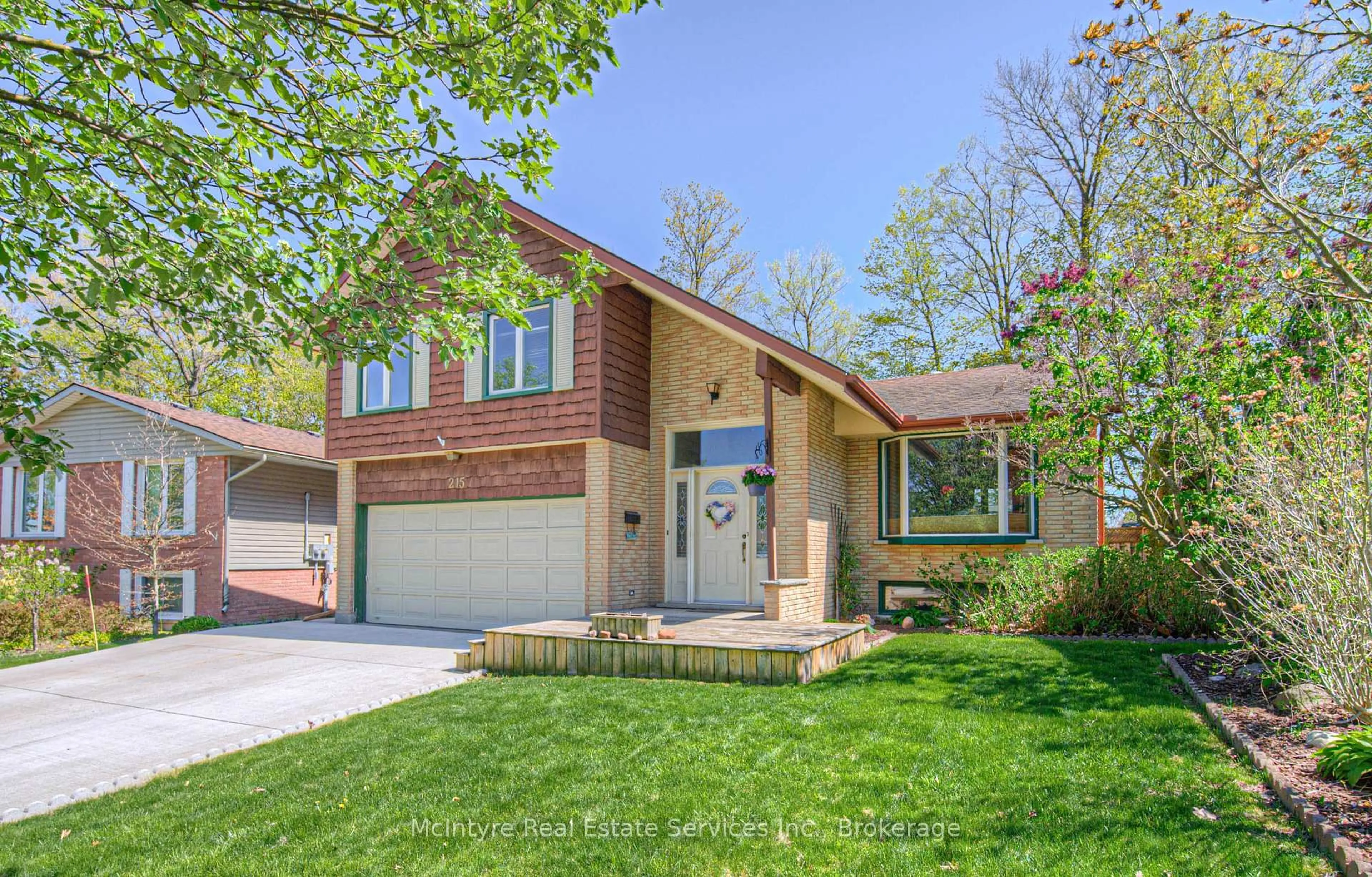 Home with vinyl exterior material, street for 215 Southwood Dr, Kitchener Ontario N2E 2B2