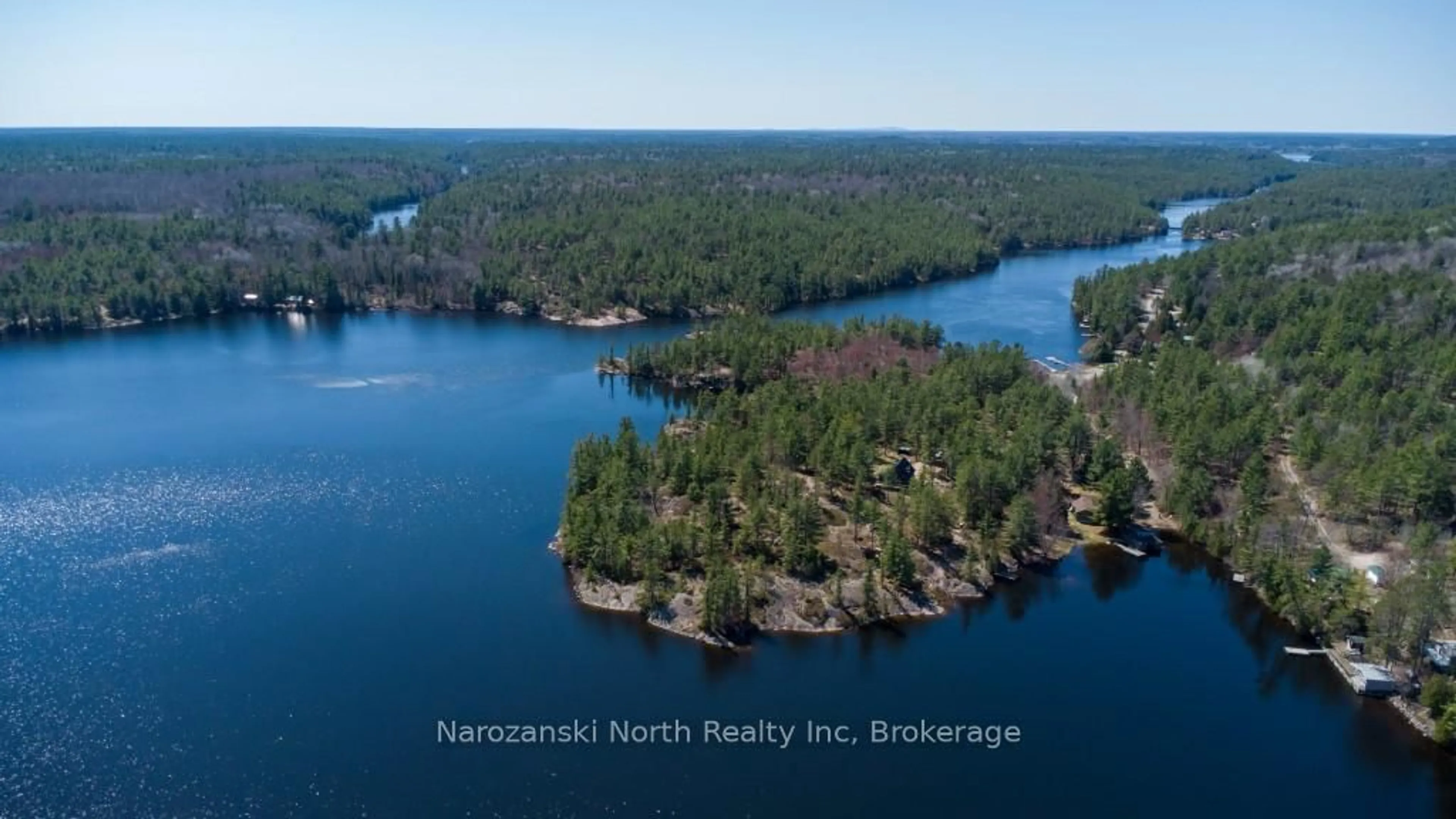 A pic from outside/outdoor area/front of a property/back of a property/a pic from drone, water/lake/river/ocean view for 118 B Plouffe Rd, French River Ontario P0M 2N0