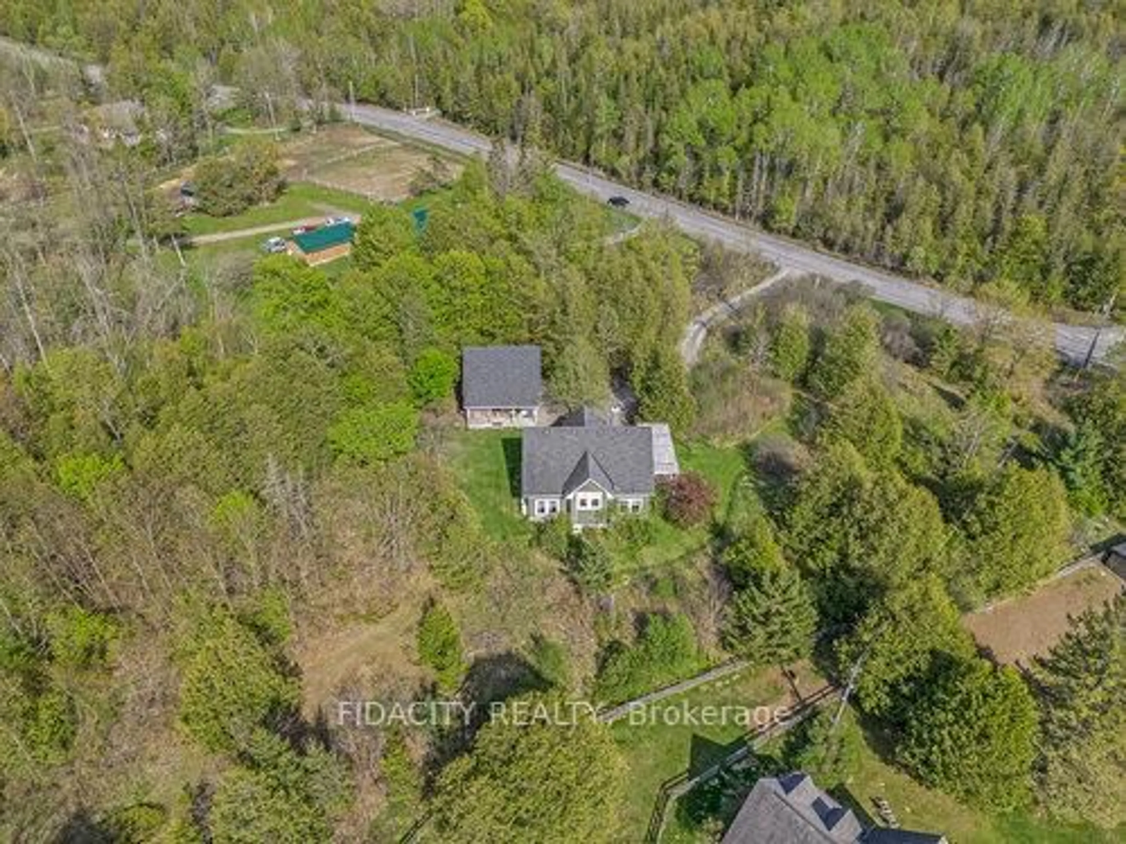 A pic from outside/outdoor area/front of a property/back of a property/a pic from drone, forest/trees view for 3675 Vaughan Side Rd, Carp Ontario K0A 1L0