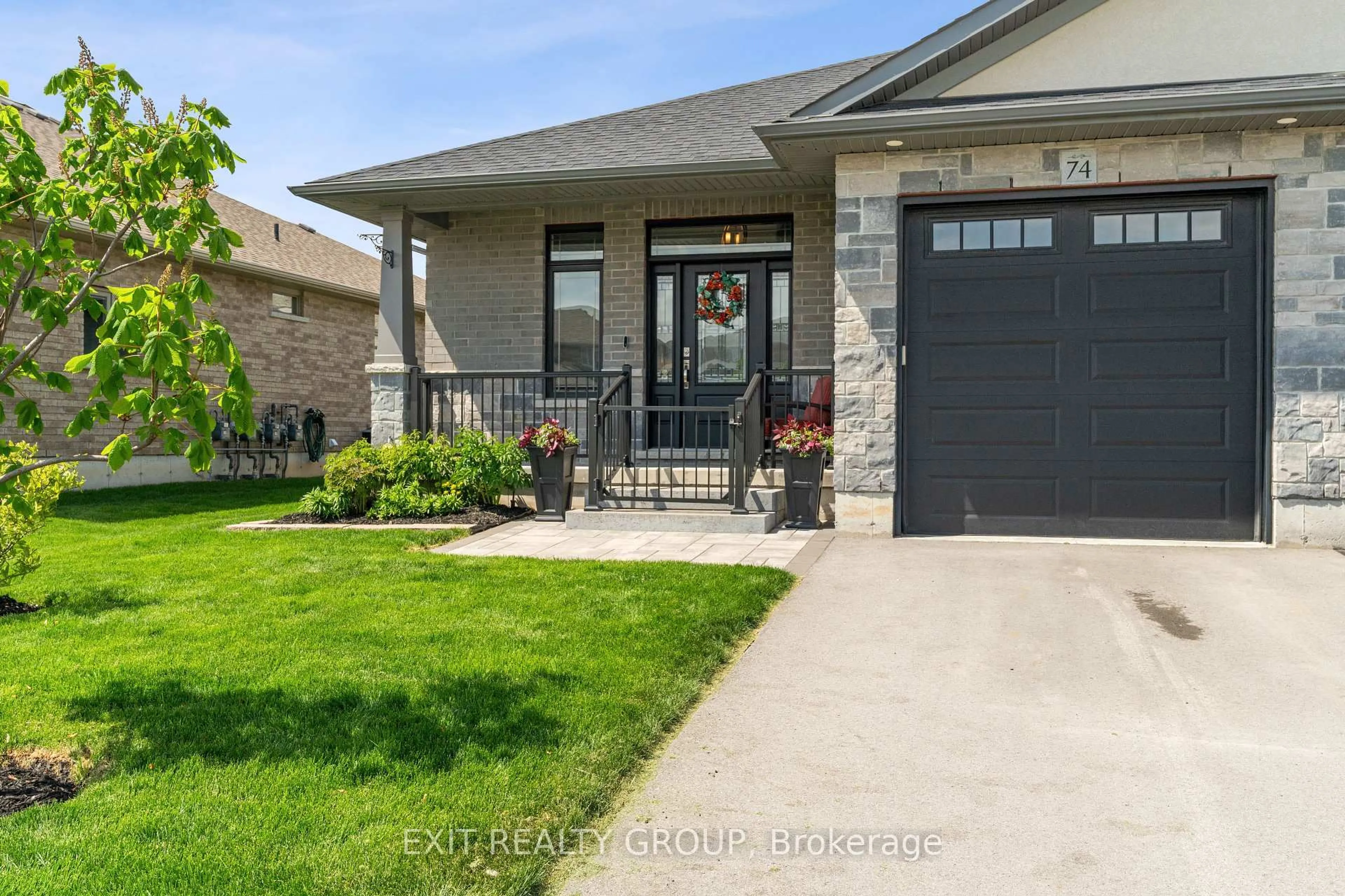 Home with brick exterior material, street for 74 Wims Way, Belleville Ontario K8N 0H8