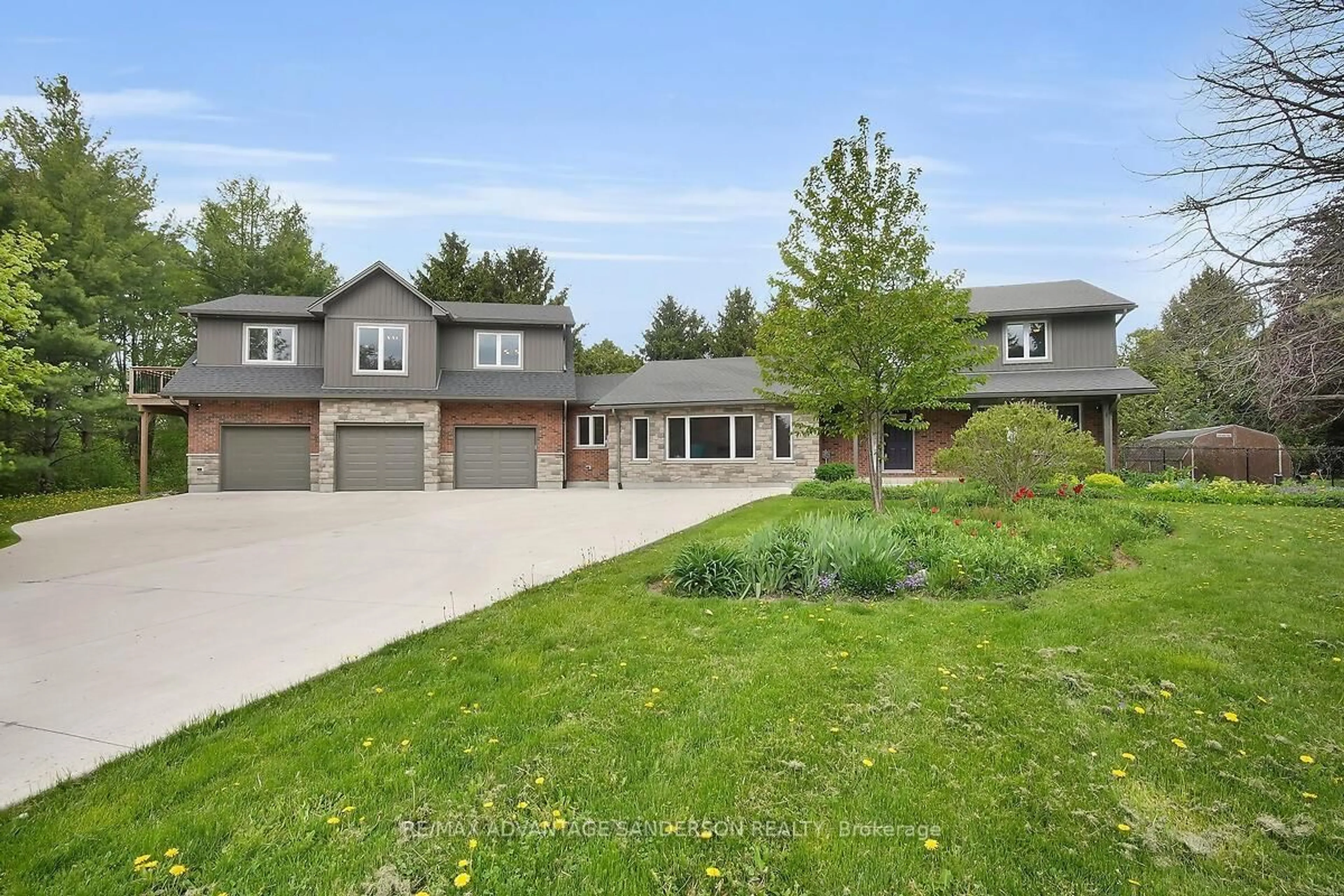 Home with brick exterior material, street for 23062 Hyde Park Rd, Middlesex Centre Ontario N0M 2A0