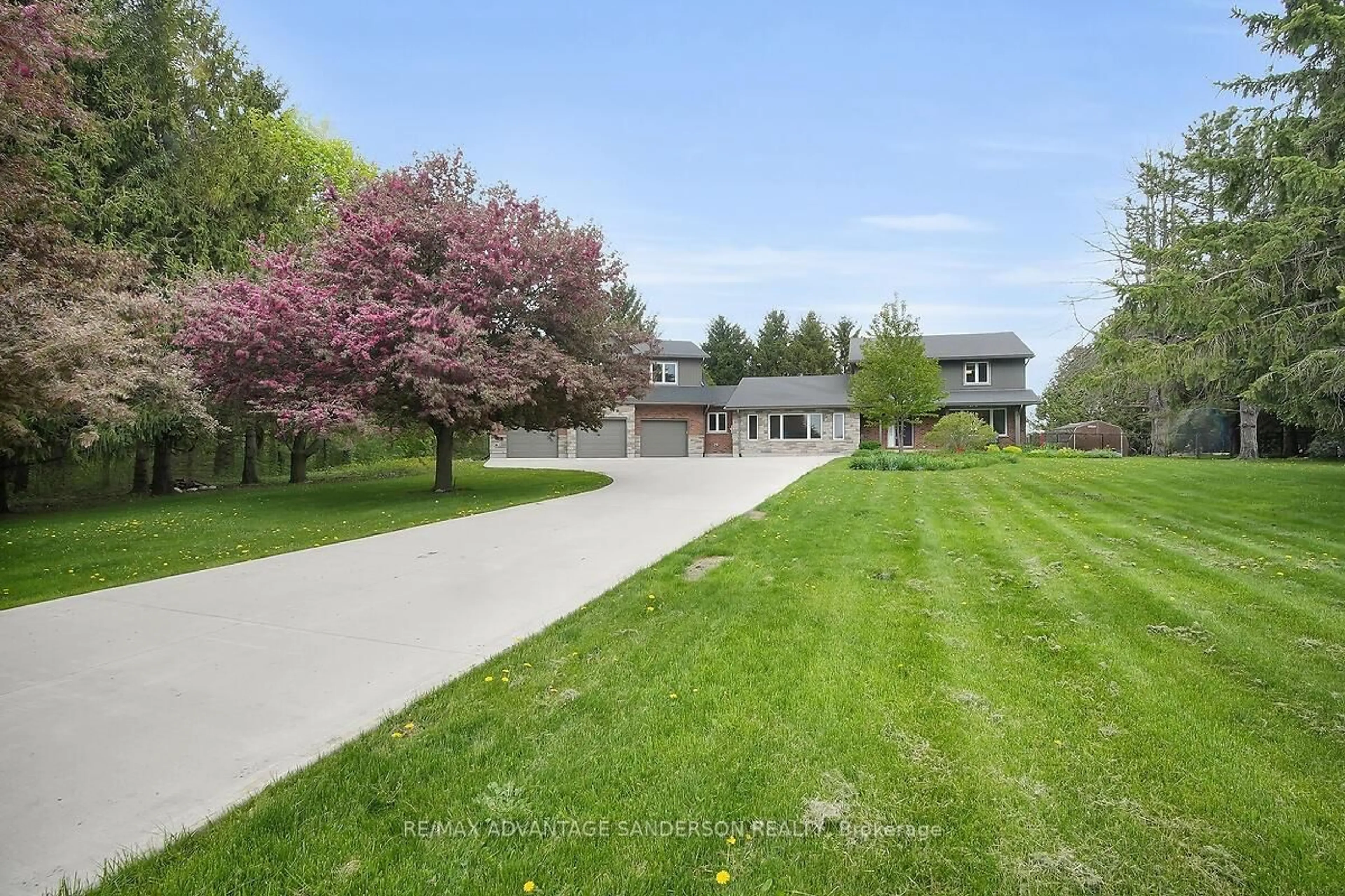 A pic from outside/outdoor area/front of a property/back of a property/a pic from drone, unknown for 23062 Hyde Park Rd, Middlesex Centre Ontario N0M 2A0