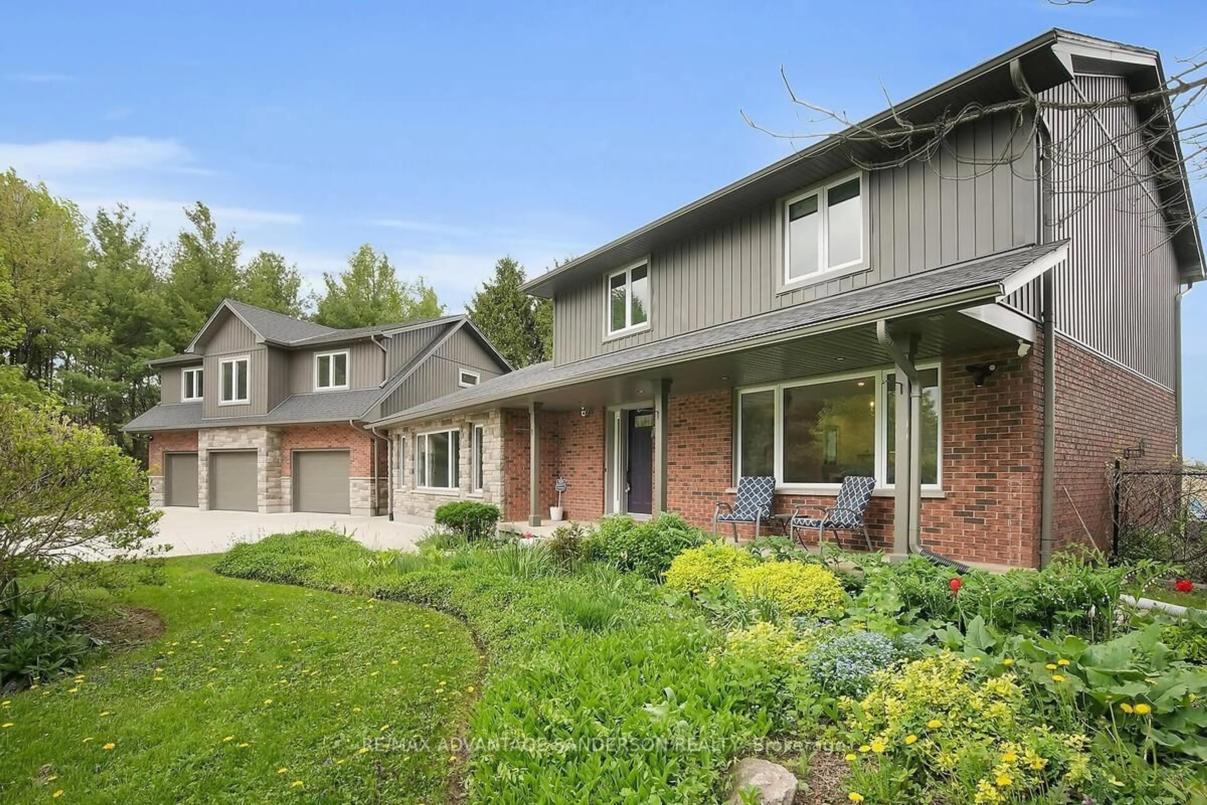 Home with brick exterior material, street for 23062 Hyde Park Rd, Middlesex Centre Ontario N0M 2A0