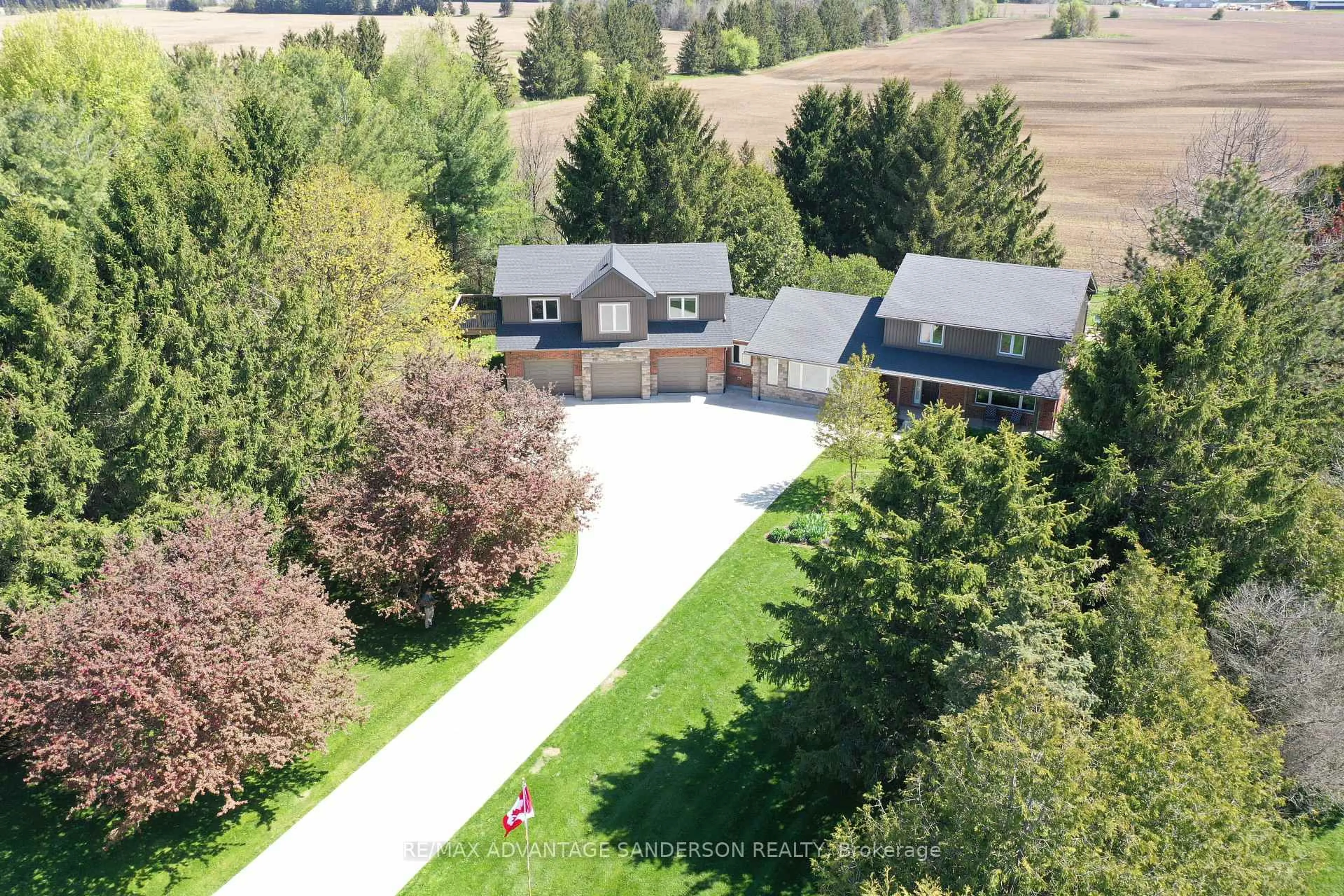 A pic from outside/outdoor area/front of a property/back of a property/a pic from drone, mountain view for 23062 Hyde Park Rd, Middlesex Centre Ontario N0M 2A0