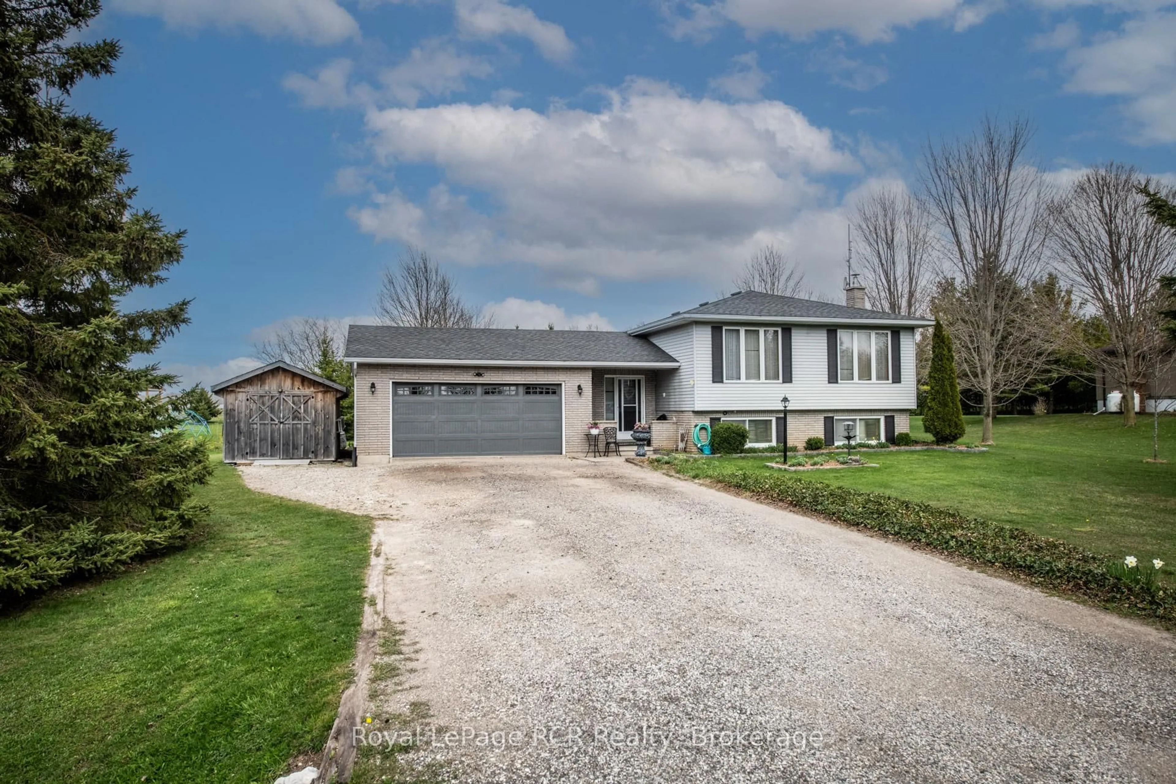 A pic from outside/outdoor area/front of a property/back of a property/a pic from drone, street for 9485 Maas Park Dr, Wellington North Ontario N0G 2L0