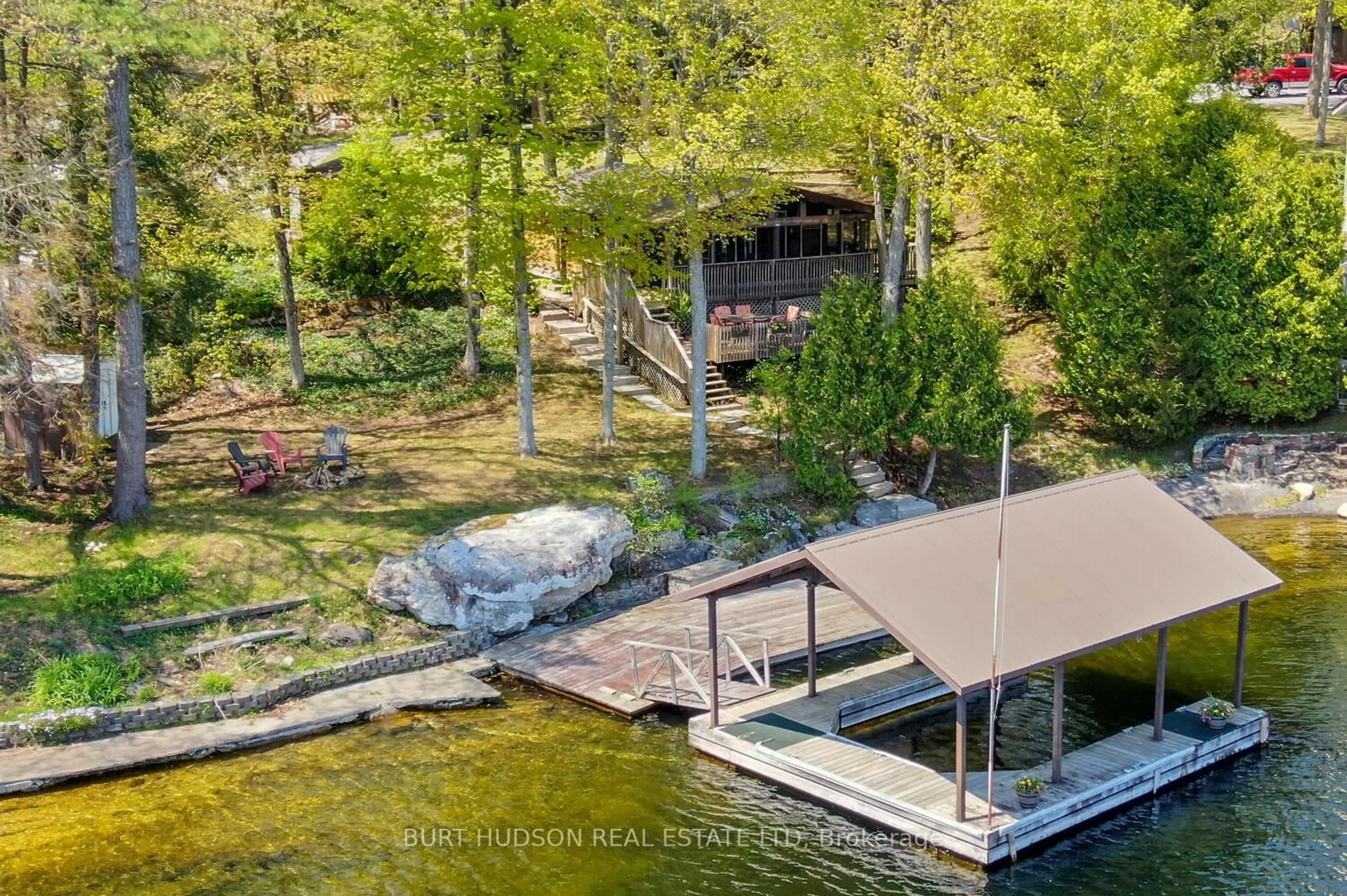 A pic from outside/outdoor area/front of a property/back of a property/a pic from drone, water/lake/river/ocean view for 911 Country Lane, Leeds and the Thousand Islands Ontario K0E 1B0