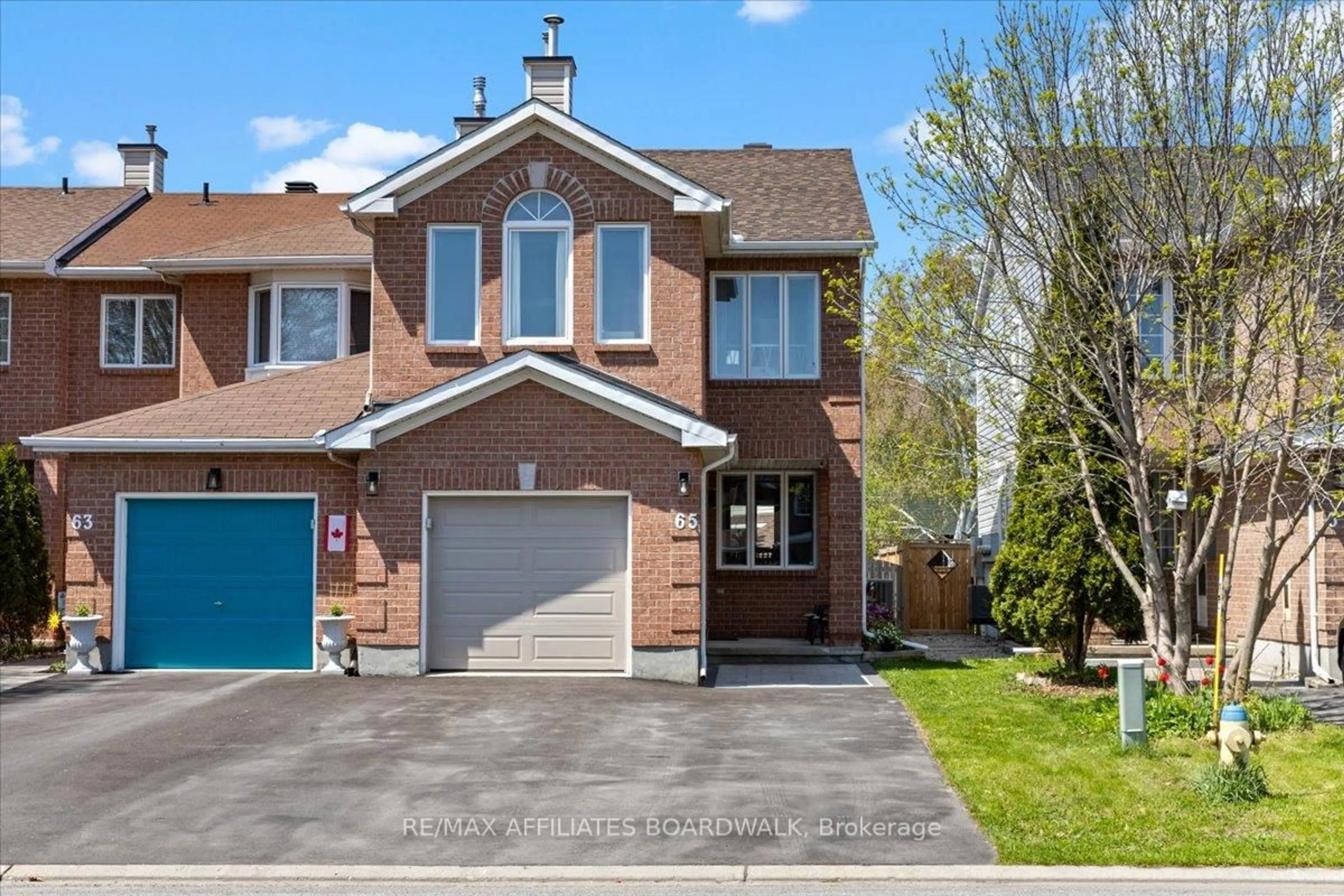 Home with brick exterior material, street for 65 Daventry Cres, Ottawa Ontario K2J 4M8