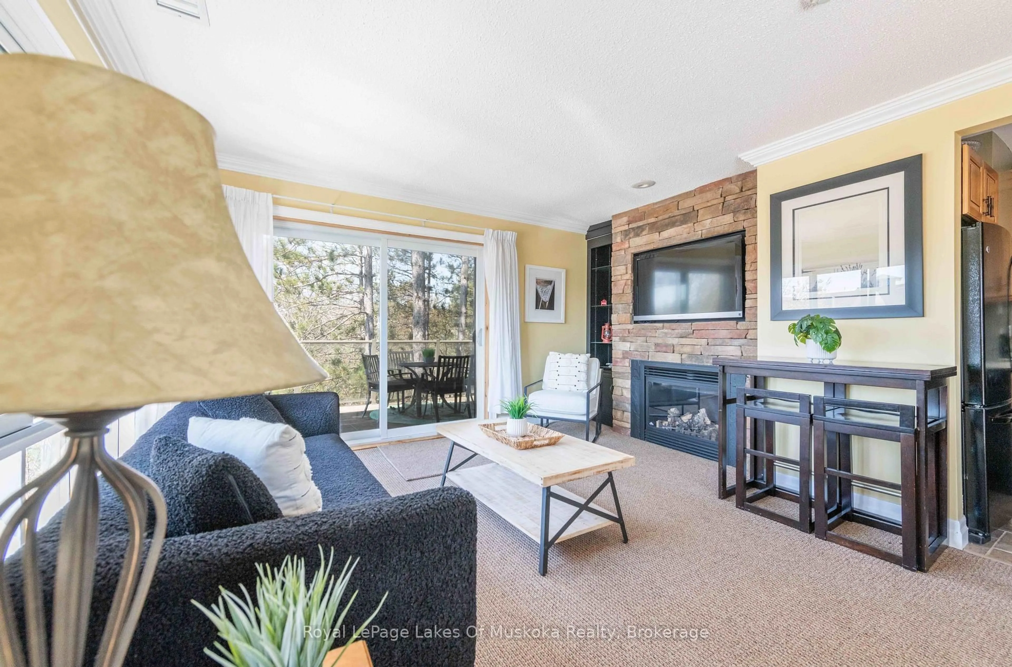 Living room with furniture, unknown for 29 Deerhurst Dr #301, Huntsville Ontario P1H 1A9