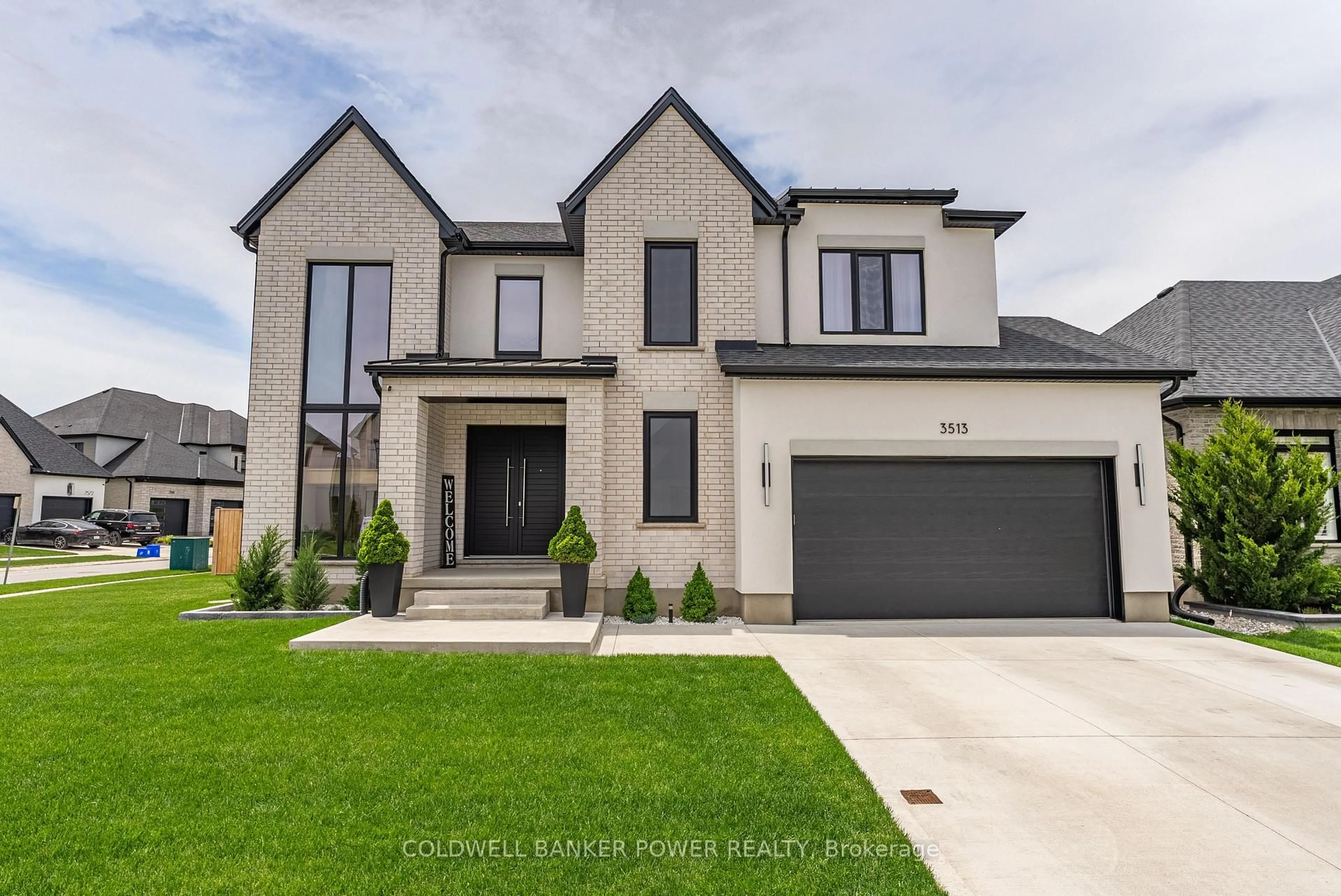 Home with brick exterior material, street for 3513 Grand Oak Crossing, London South Ontario N6P 0G7