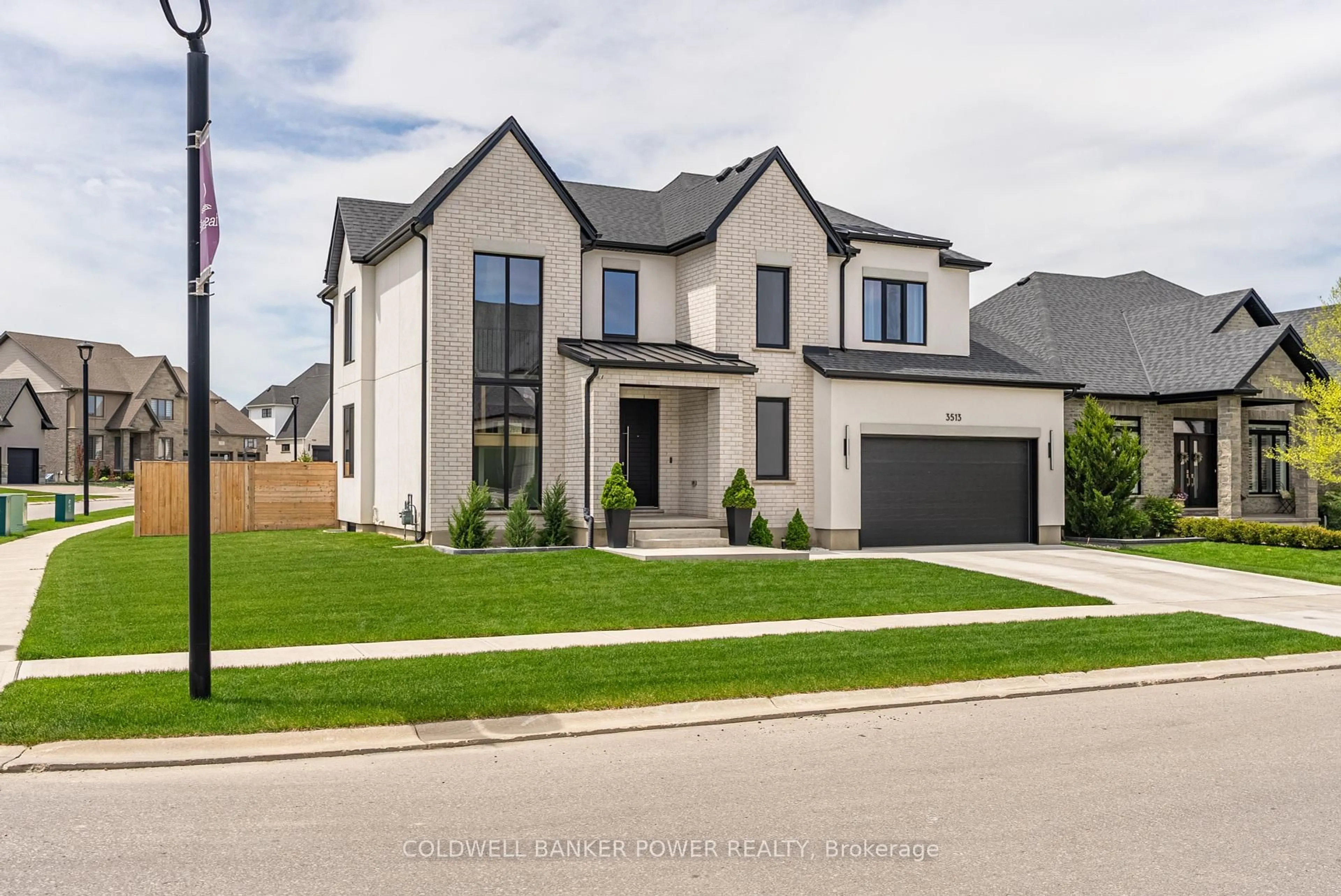 Home with brick exterior material, street for 3513 Grand Oak Crossing, London South Ontario N6P 0G7